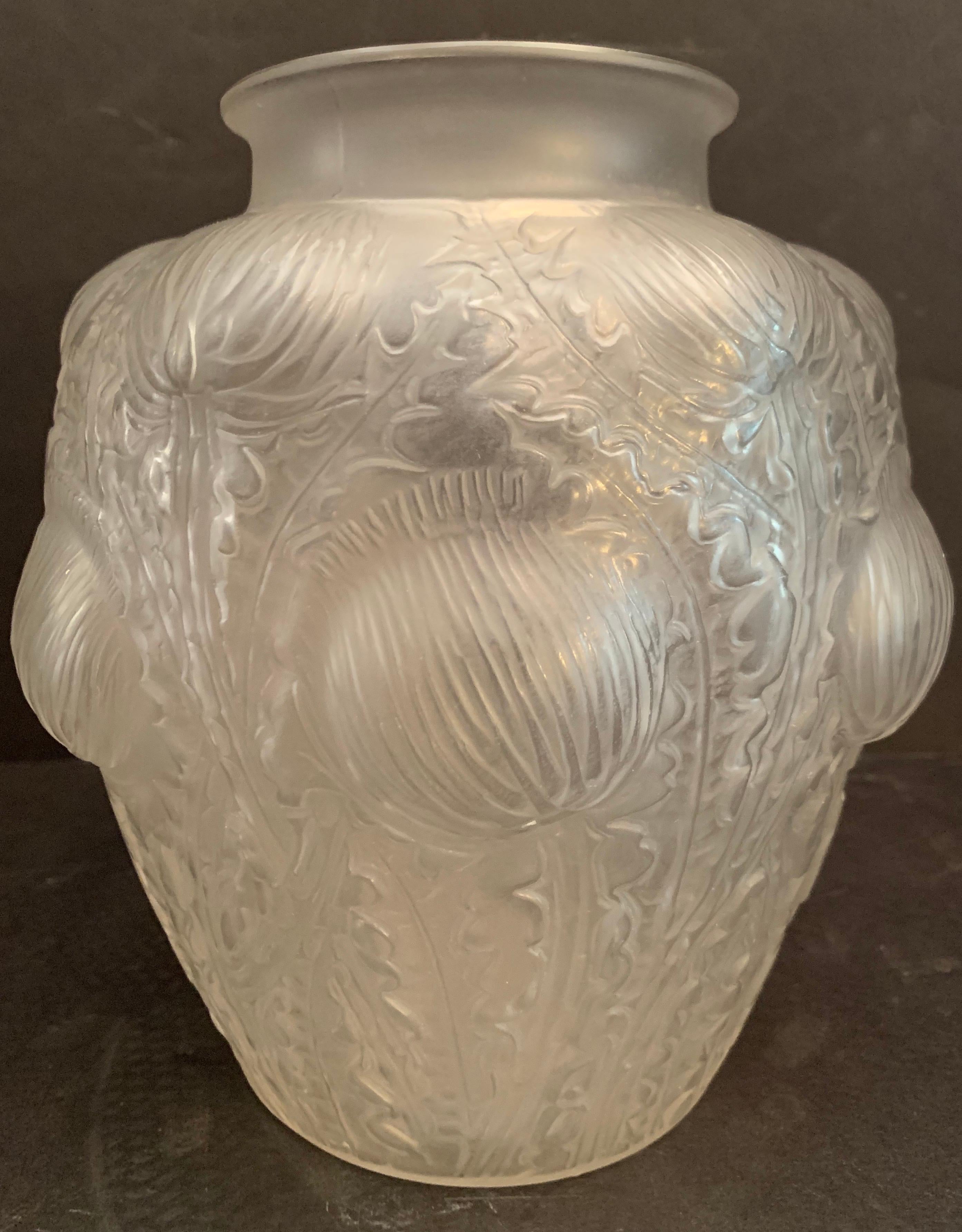 A wonderful signed René Lalique Domremy Art glass flower vase.


 