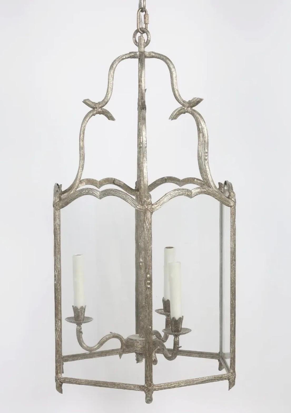 A wonderful silver gilt branch form and 6-panel glass Baguès / Vaughn style Large lantern pendant fixture with 3 candelabra lights finished off with an extraordinary ceiling canopy.
Ready to install and enjoy in any space.