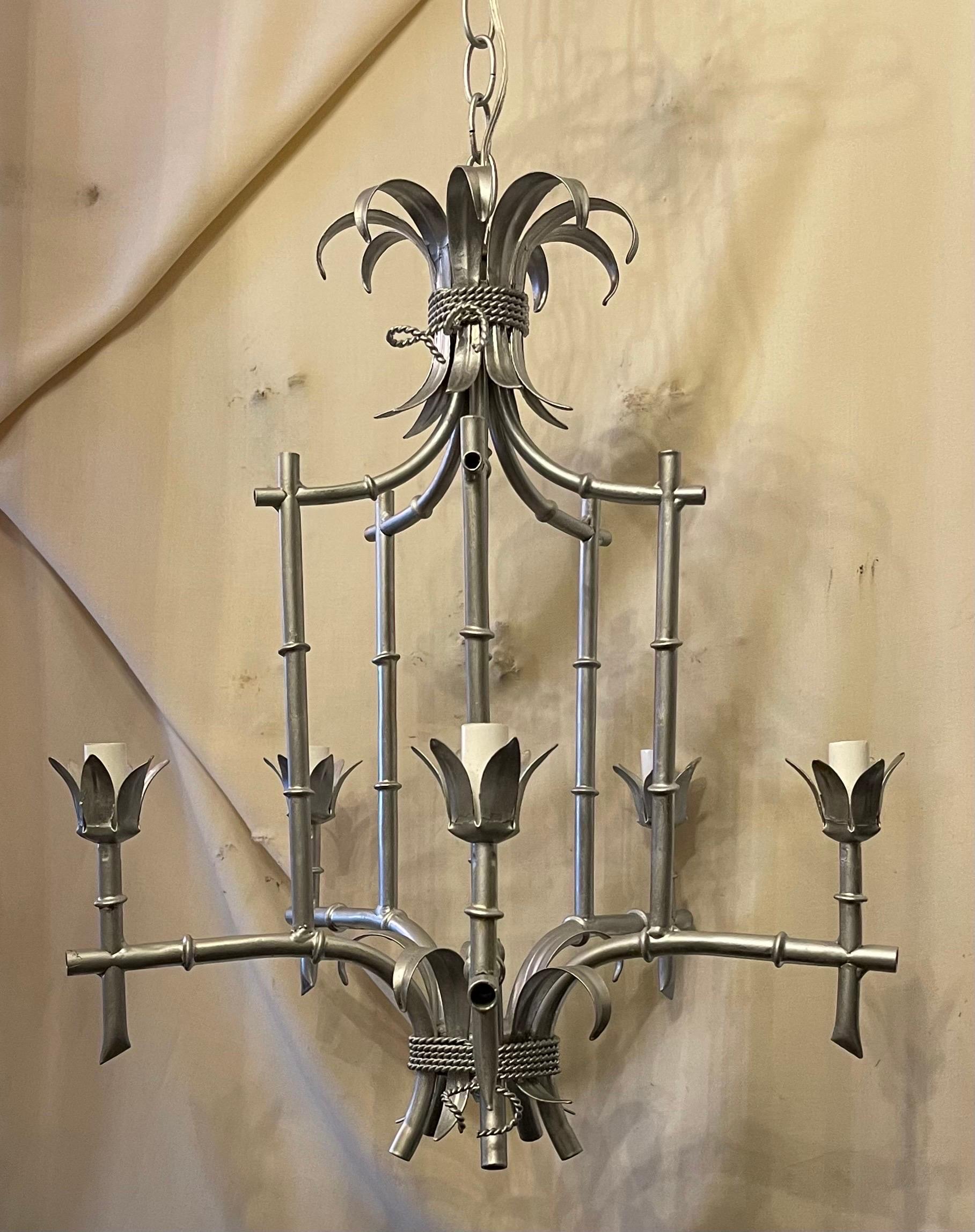 A Wonderful Silver Gilt Tole Pagoda Bamboo Chinoiserie Form 5 Candelabra Light Chandelier, This Fixture Comes Ready To Install With Chain Canopy and Mounting Hardware.
Wiring Has Been Up Dated 