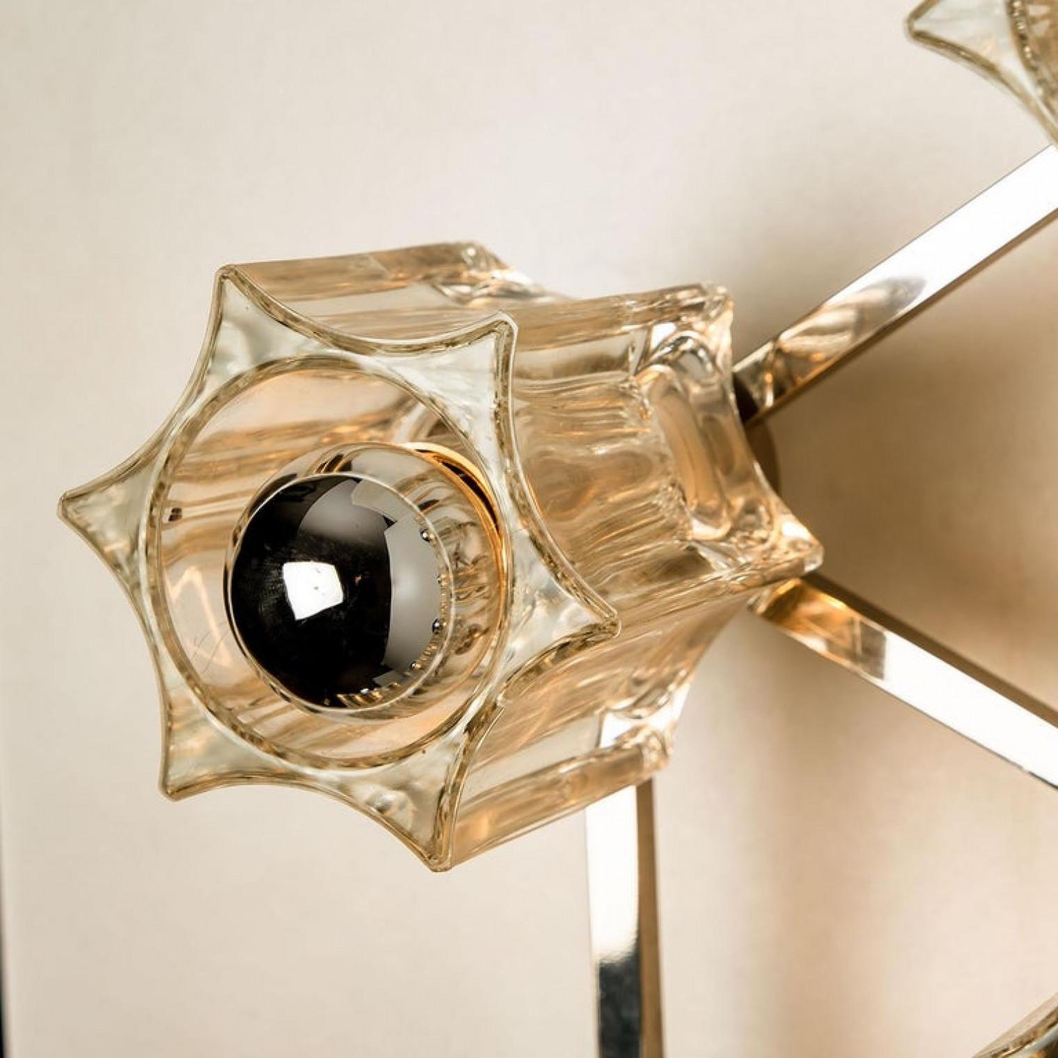 Exclusive Sputnik crystal glass flush mount/ wall light designed by Sciolari for Peil & Putzler, Germany, 1970s
Wonderful light effect.

Dimensions
D 17.3 
