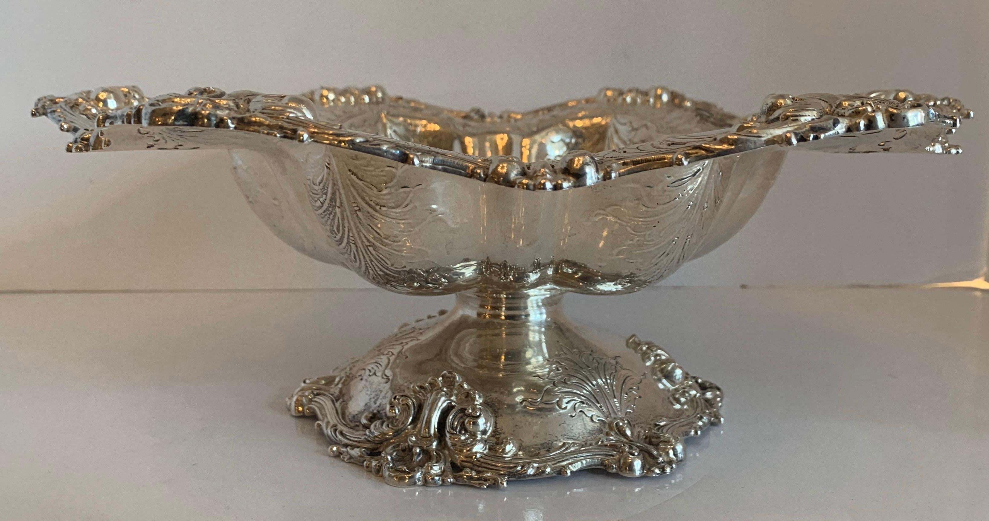 A wonderful sterling silver whiting pierced reposse hand chased centerpiece bowl

Measures: 13