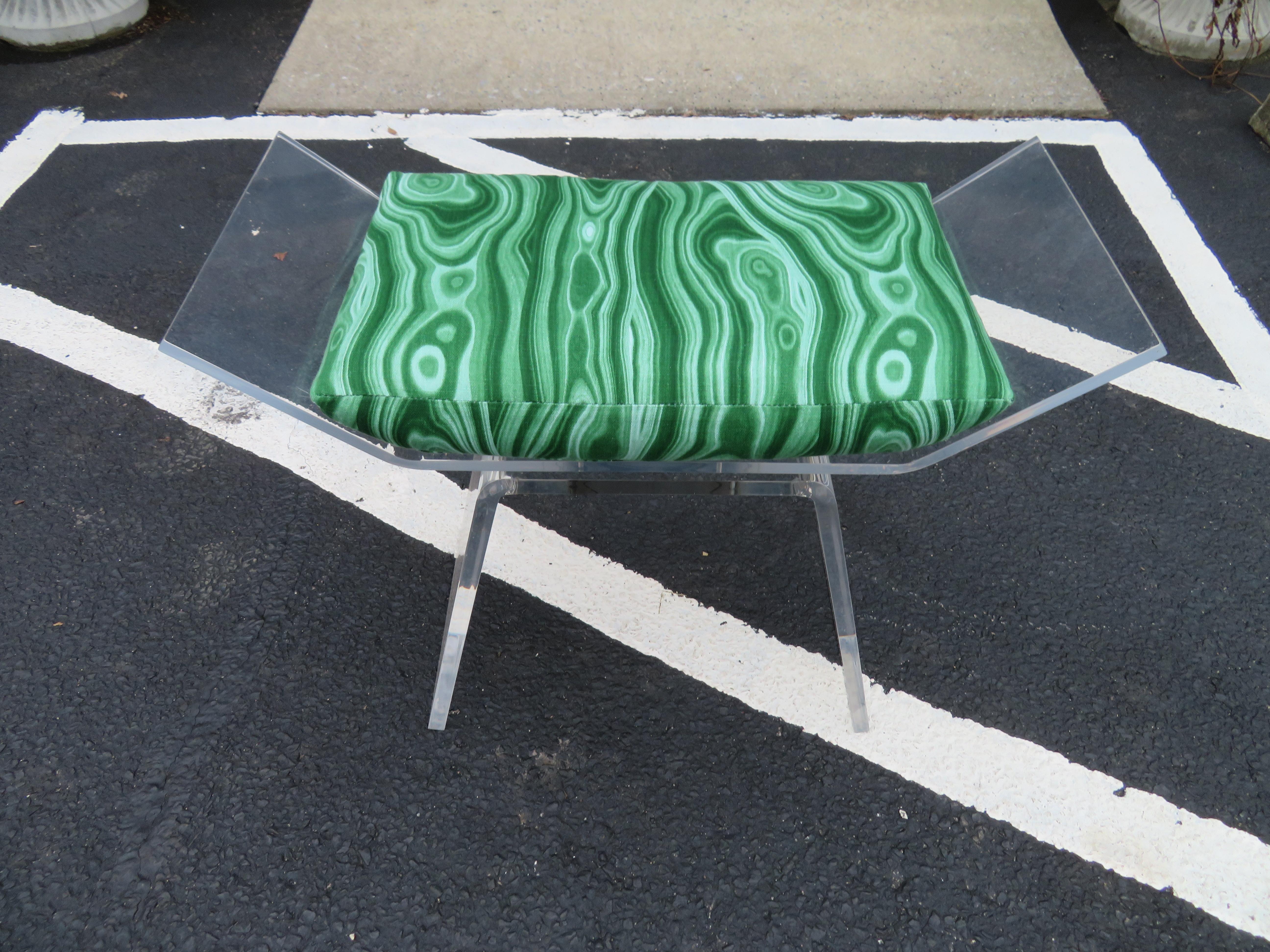 Wonderful Karl Springer style swivel seat Lucite stool. We love the wing like swivel seat with gorgeous newly made malachite cushion.