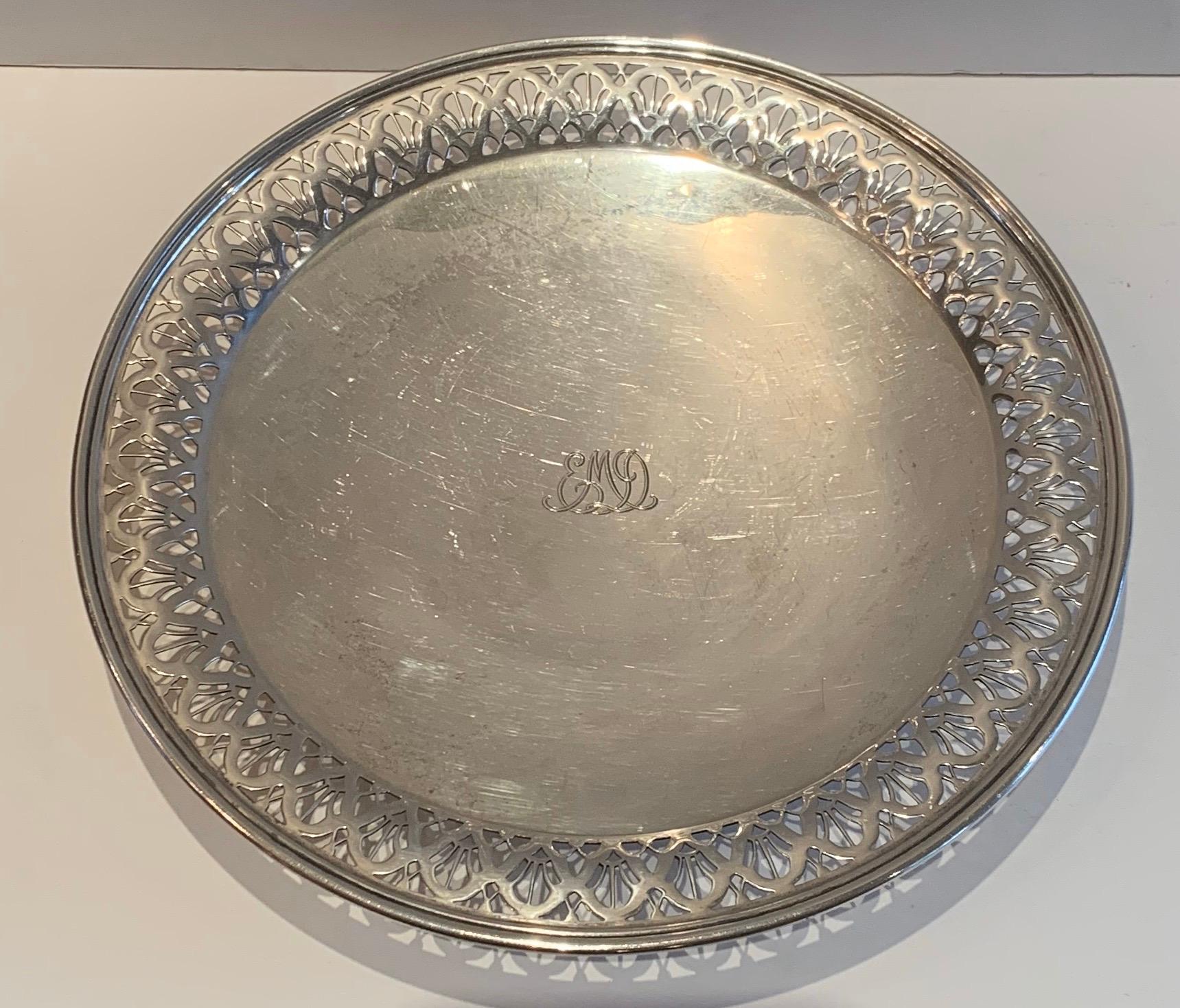 A wonderful Tiffany & Co. sterling silver round regency pierced tray centerpiece platter.