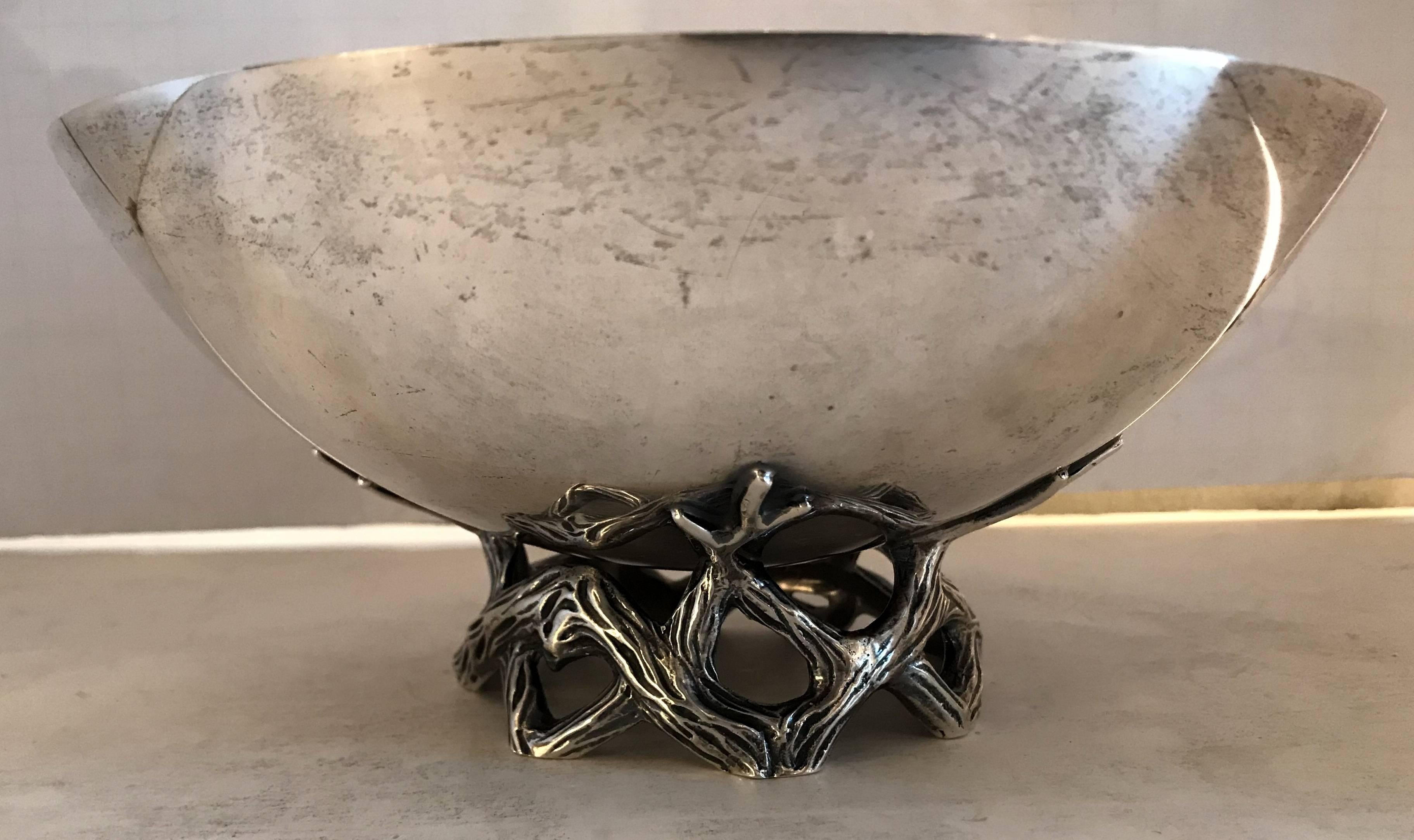 A wonderful Tiffany & CO. Sterling silver centrepiece with branch's and vines for the open worked elevated base with elegant plain bowl.