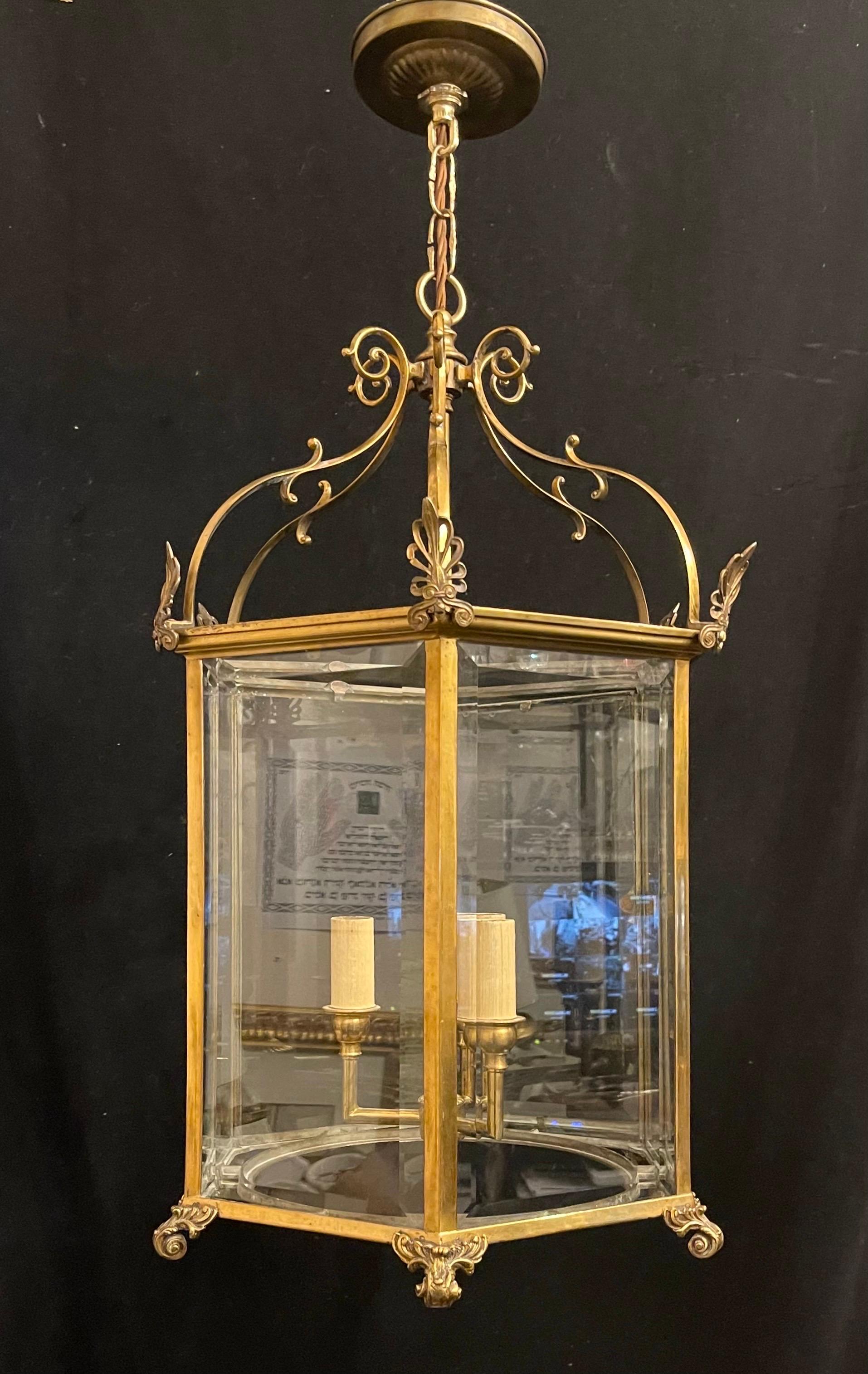 A Wonderful Vaughan Designs Style Brass / Bronze With Inset Glass Panels, Hexagon Shaped English Regency Design Lantern
Wired With 3 Candelabra Sockets, Ready To Install With Chain And Canopy.


