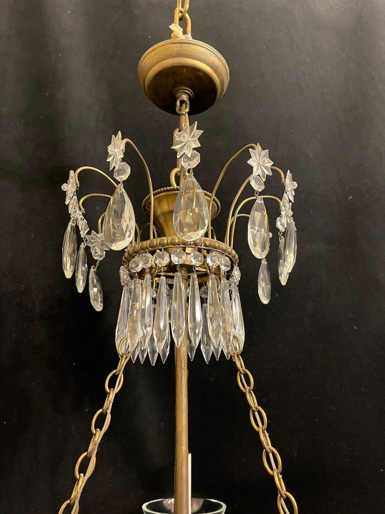 A Wonderful Vaughan lighting bell jar blown glass & bronze Regency neoclassical lantern fixture with 3 internal candelabra lights and three candelabra arms.