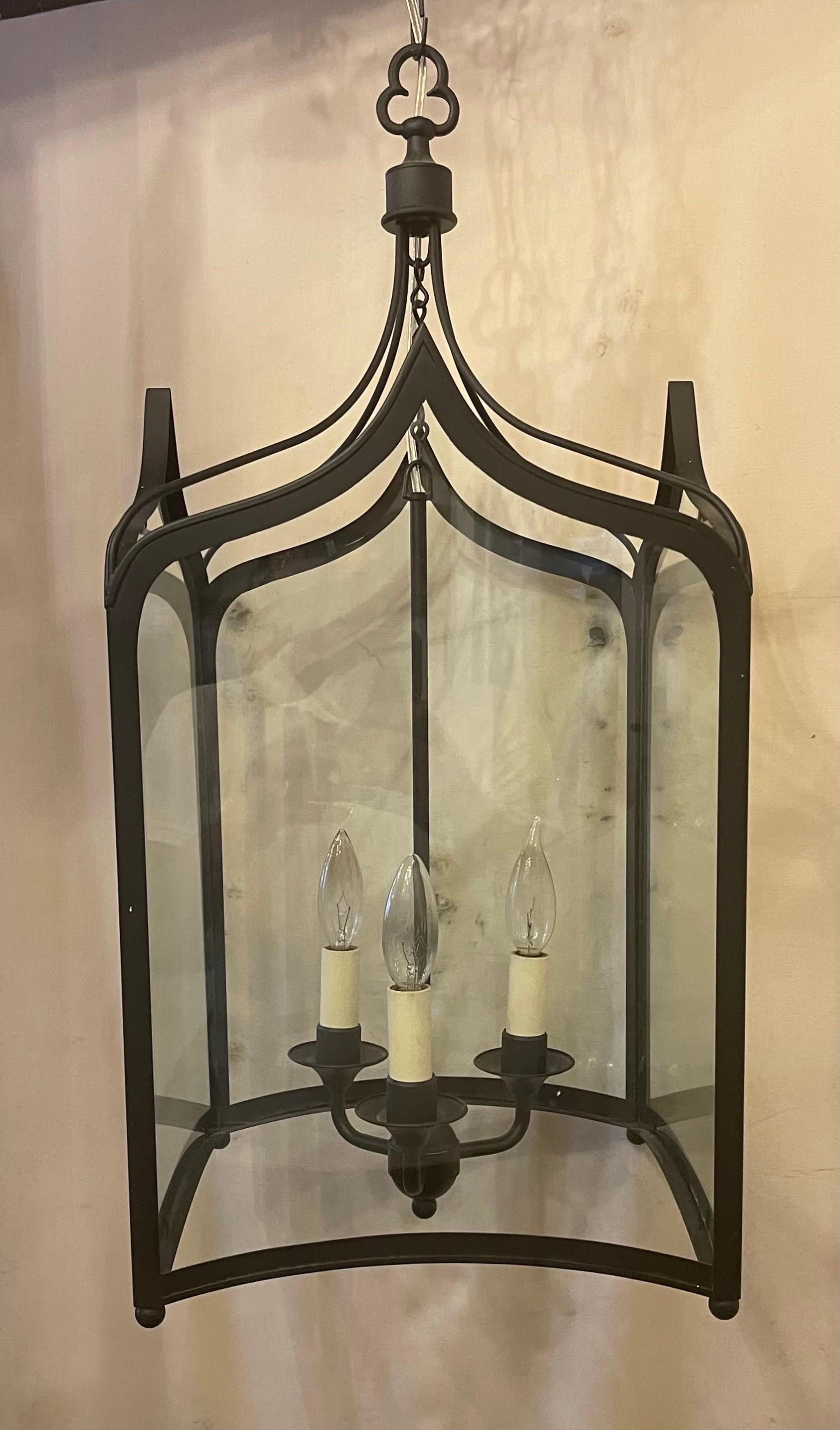 Wonderful Vaughan Lighting Regency Square Arched Black Iron 3 Lanterns Fixtures In Good Condition For Sale In Roslyn, NY