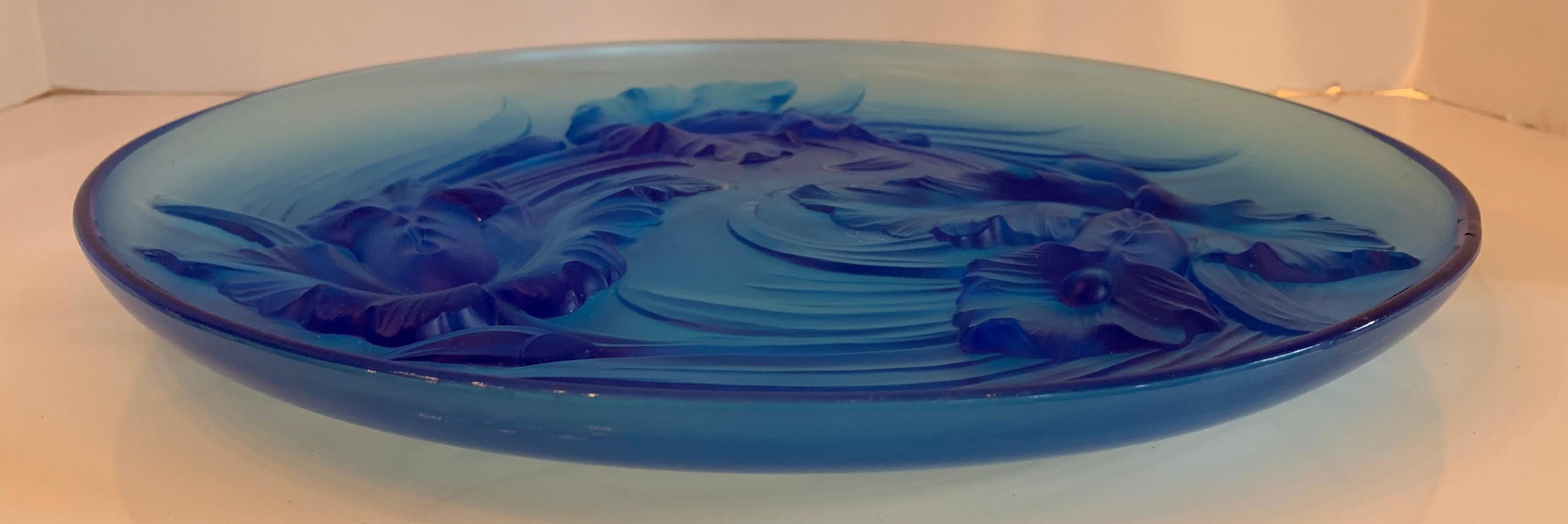 A wonderful Verlys blue art glass centerpiece platter bowl of blown out orchid flowers.