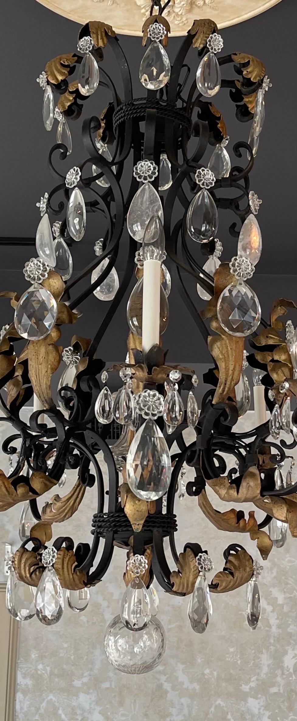 A wonderful very large French wrought iron with gold gilt highlights & rock crystals in The Louis XV style in The Manner Of Maison Bagues chandelier.