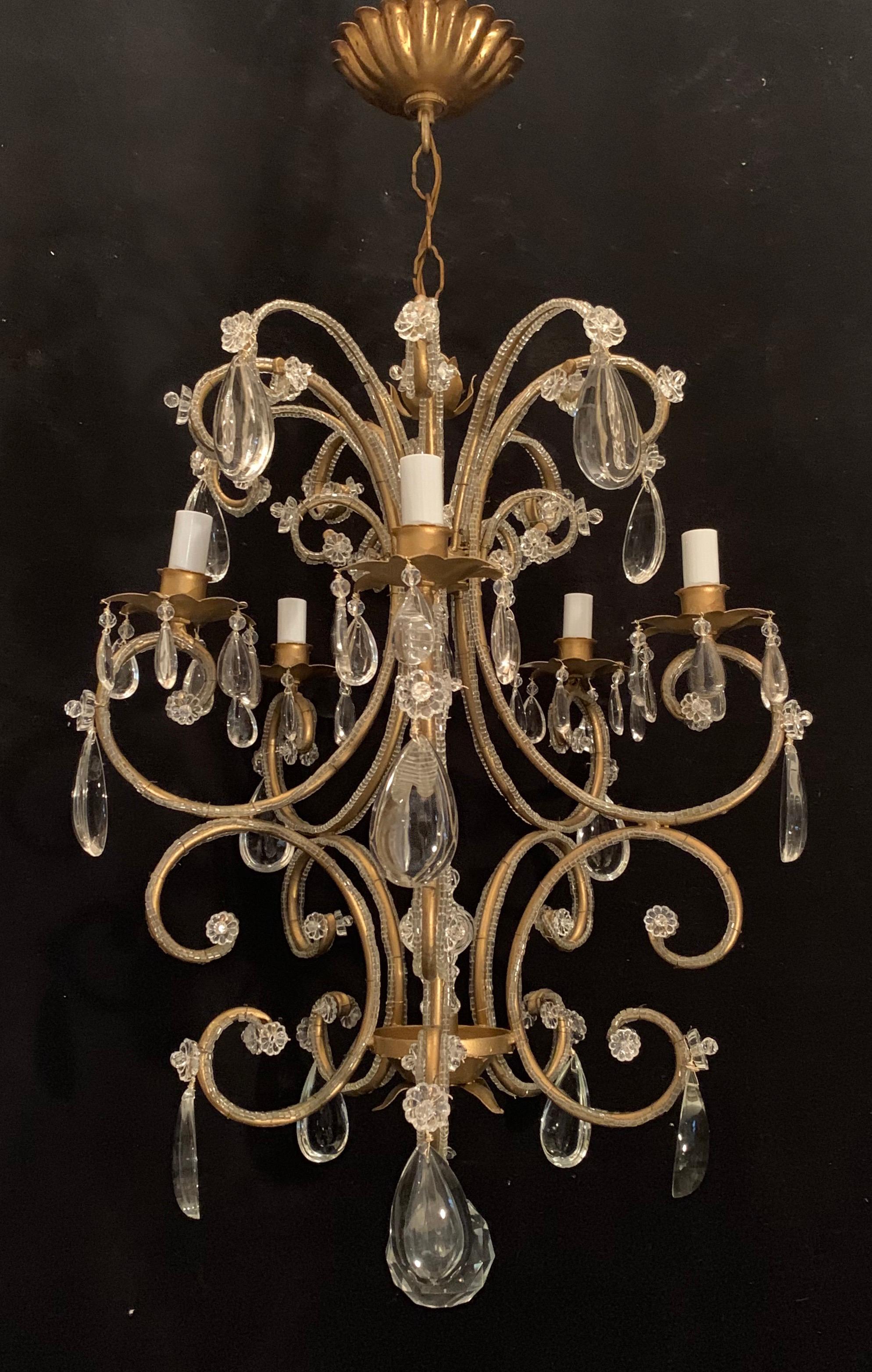 A wonderful vintage gold gilt & beaded crystal Baguès style chandelier with 5-candelabra lights & center crystal medallion spear.