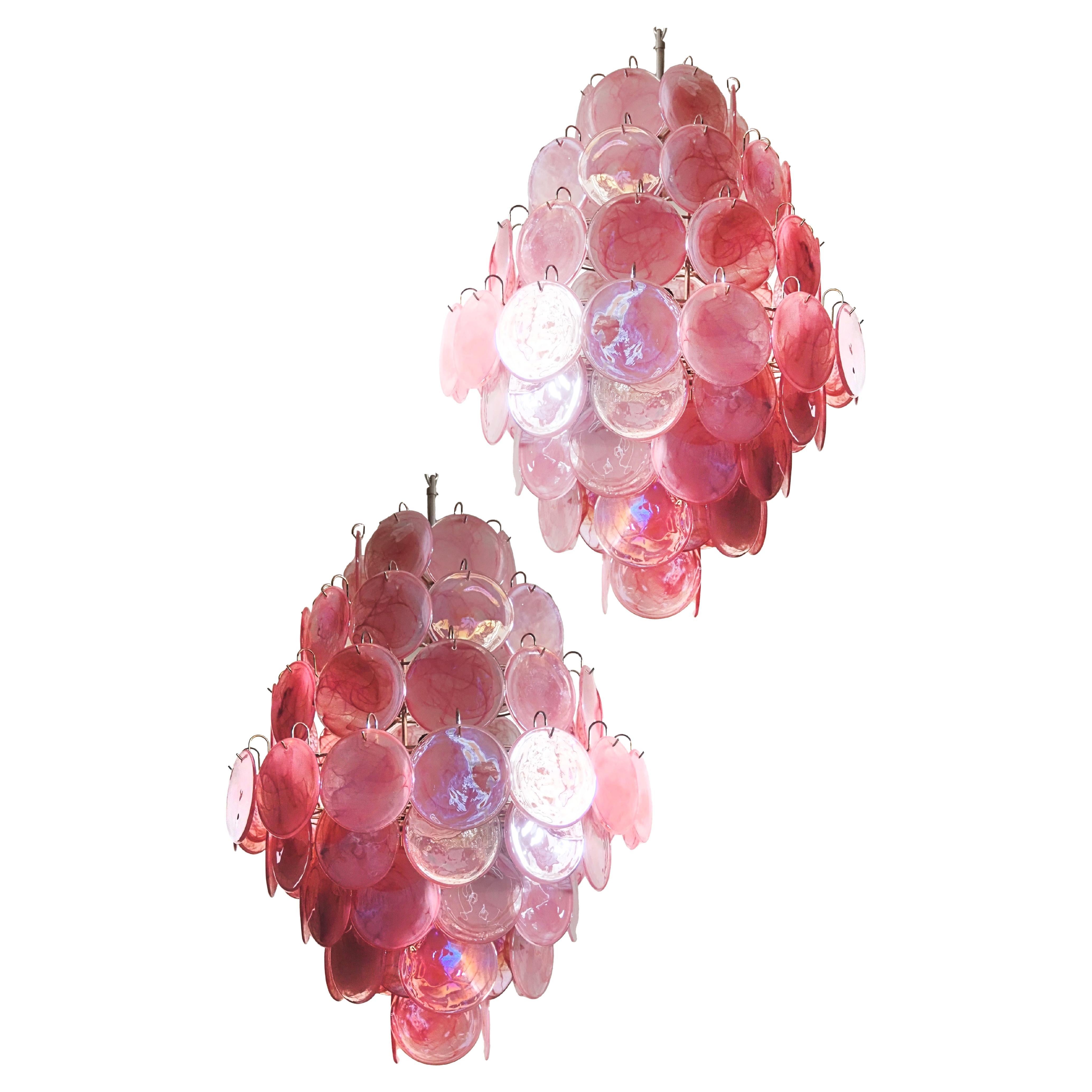 Huge Vintage Italian Murano chandeliers - 87 pink alabaster disks
Vintage Italian Murano chandeliers in Vistosi style. Each chandelier has 87 fantastic pink alabaster iridescent glasses in a nickel metal frame.
Period: late XX century
Dimensions: