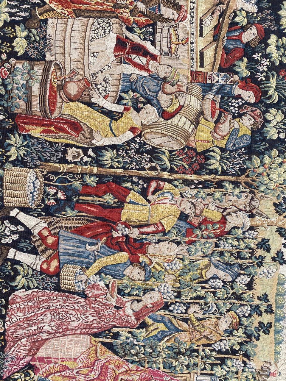 Very beautiful French tapestry with a medieval design of harvest (Vendanges), and beautiful colors, mechanical Jaquar manufacturing with wool.