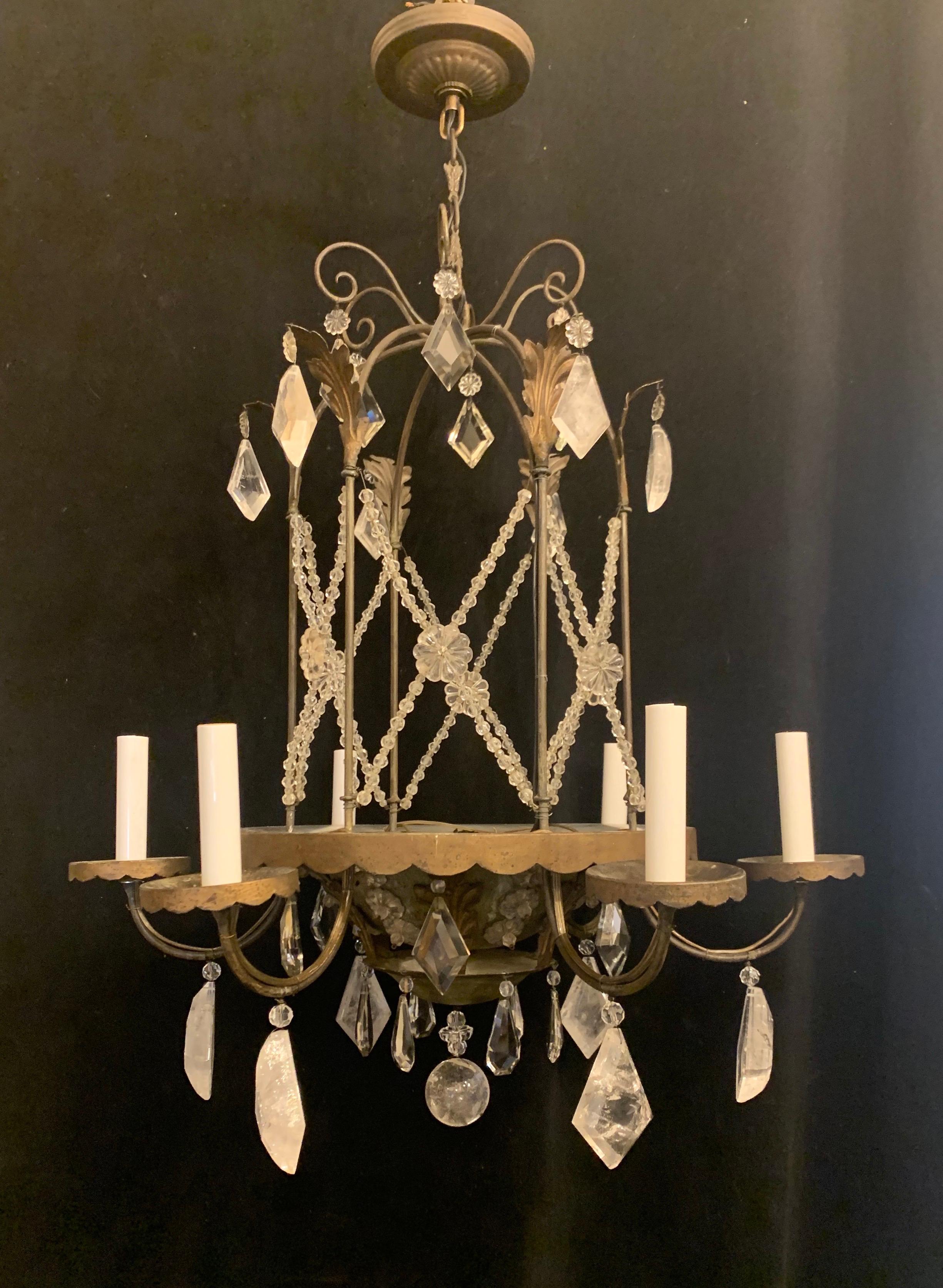 A wonderful vintage Maison Baguès style green tole with rock crystals and beads and flowers 6 arm chandelier with two lights on the inside, rewired and ready to enjoy with chain canopy and mounting hardware included.