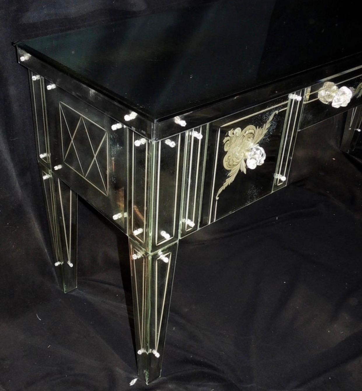A wonderful vintage Venetian antique etched beveled mirrored with Lucite drawer handle vanity, ladies desk with newly cream velvet lined drawers and slow close mechanism.
This is a truly stunning piece for any space, purchase from Lorin Marsh.