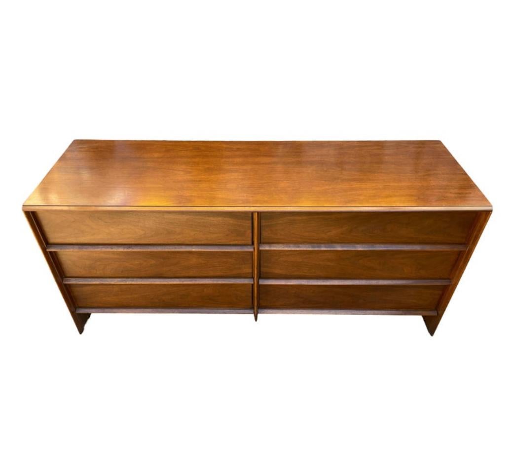 Wonderful walnut 6 drawer walnut dresser credenza or sideboard by T.H. Robsjohn-Gibbings for Widdicomb - Great vintage condition - Shows little signs of use. Has 6 solid oak drawers with moving dividers. Great simple designed credenza. Clean inside