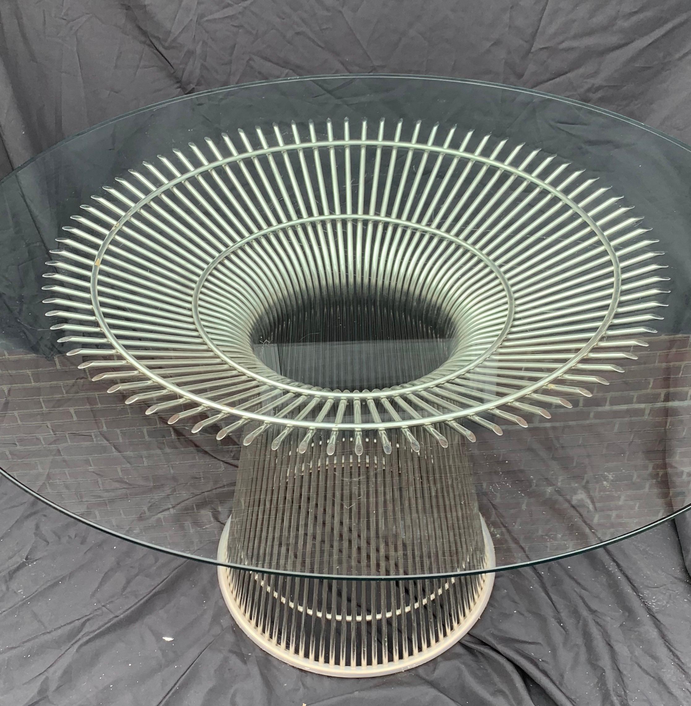 A wonderful warren platner for Knoll style wire form nickel and beveled glass top round dining or center table.