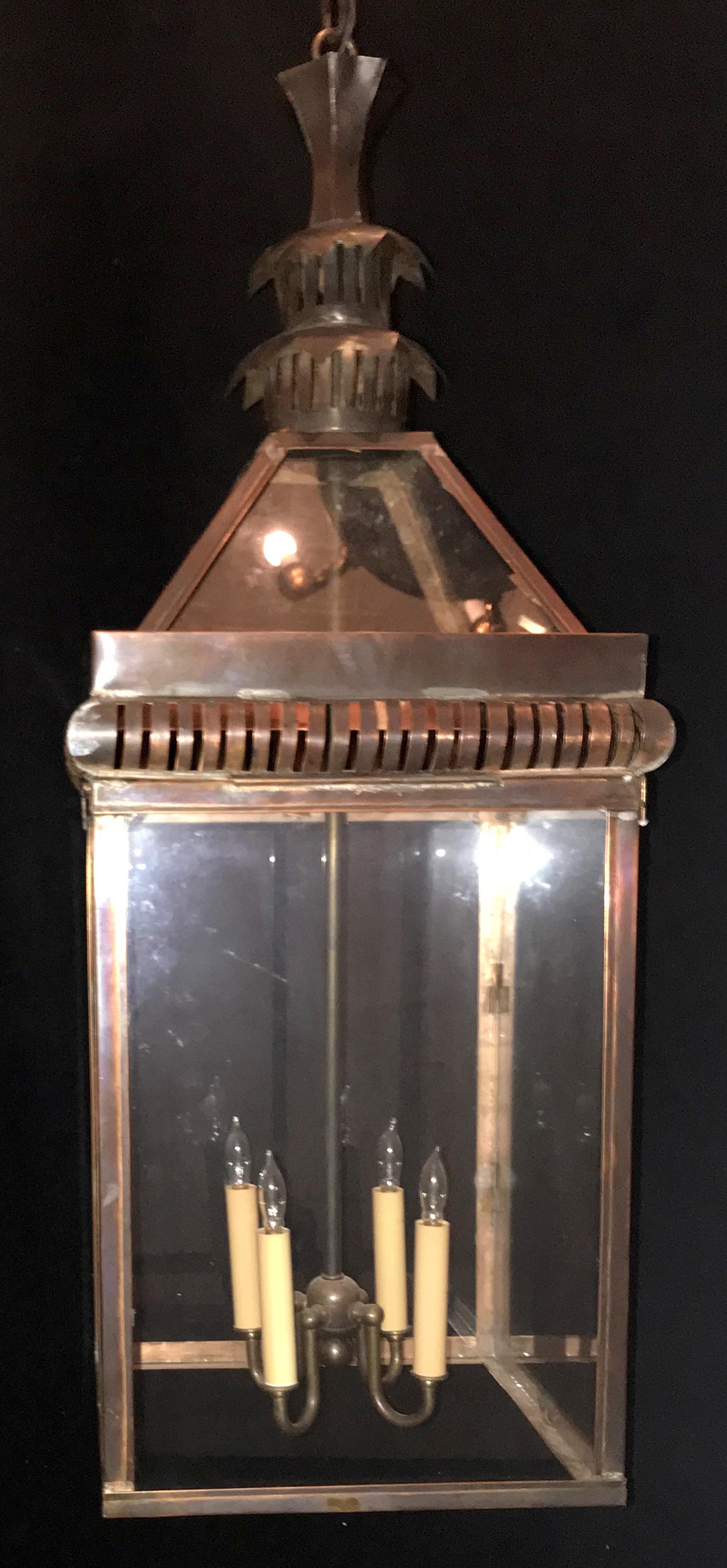 A wonderful weathered chinoiserie pagoda form copper large fixture with pierced crown and fitted with four candelabra lights each taking up to 40 watts per socket.