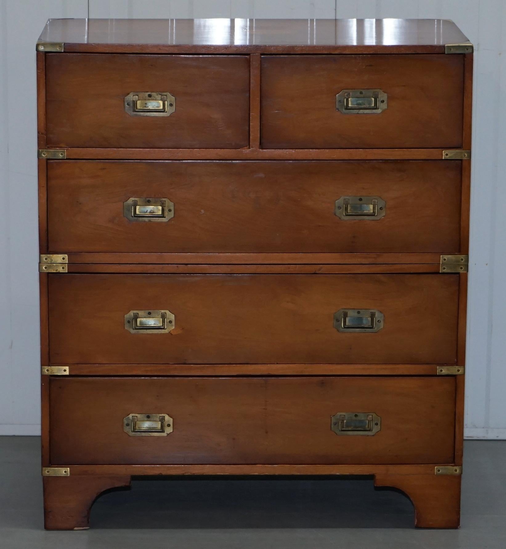 We are delighted to offer for sale lovely original period Yew wood with brass fittings Campaign Military chest of drawers

A good looking and decorative chest of drawers, made in the Campaign style, the drawers split into two easy to transport
