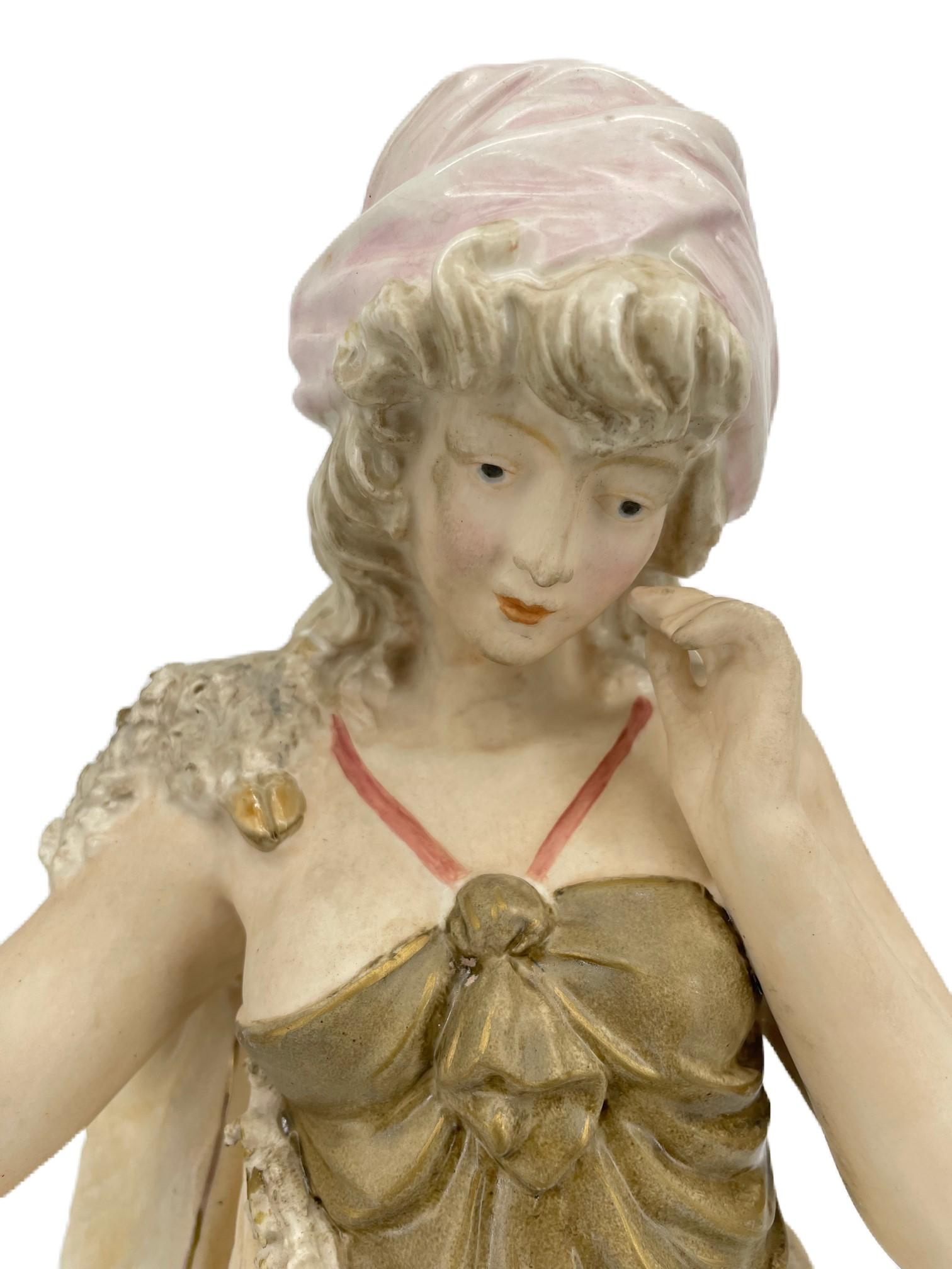 Wonderfully designed shepherdess made by Royal Dux Bohemia.
Marked with the pink triangular stamp of Eduard Eichler.
Factory no. 352. In excellent condition. 
The factory Royal Dux , porcelain brand Bohemia , was shown at the beginning of xx th