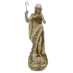 Pastora maravillosamente diseñada por Royal Dux Bohemia