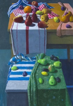 Fruit and Kitchen Towels on Two Tables