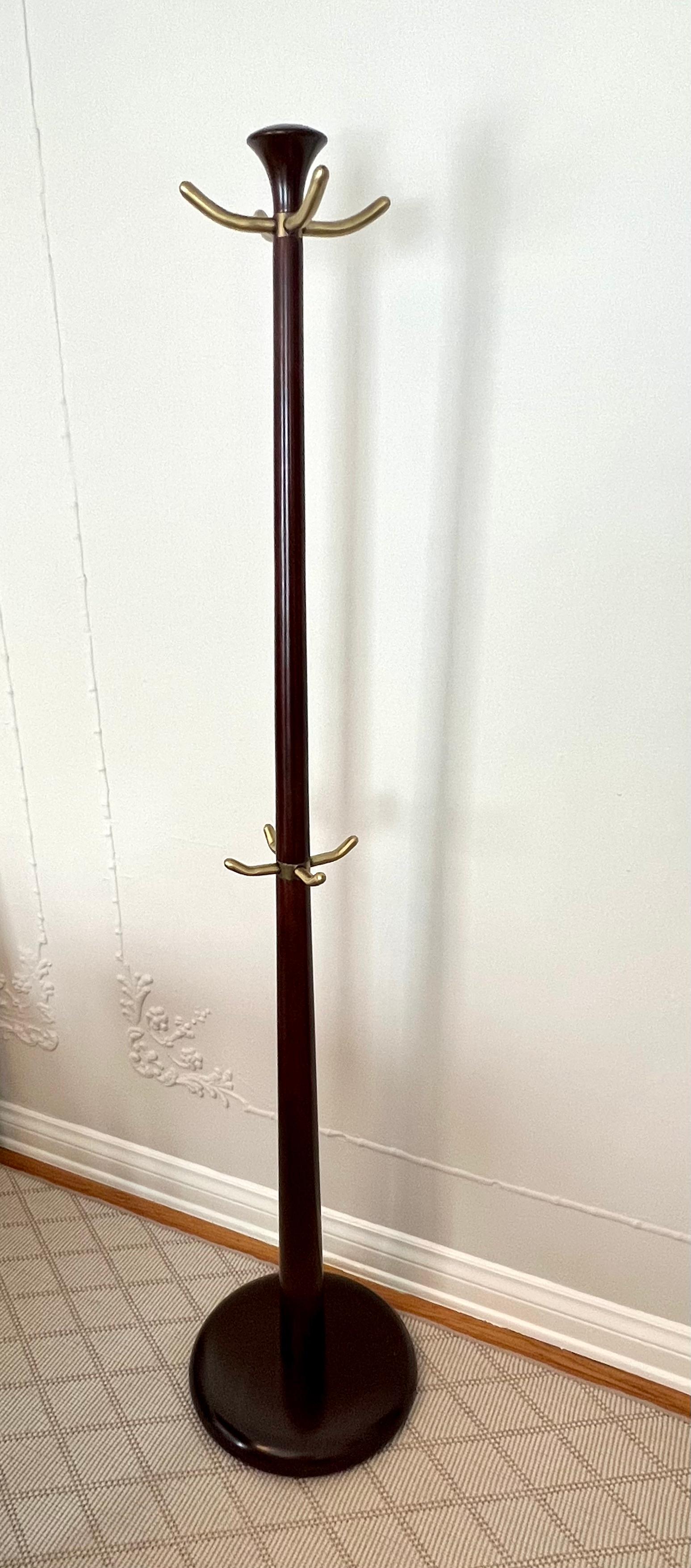 A wonderful coat rack, inspired by an Italian design from the 1940's. 

Tall and architectural, at 72
