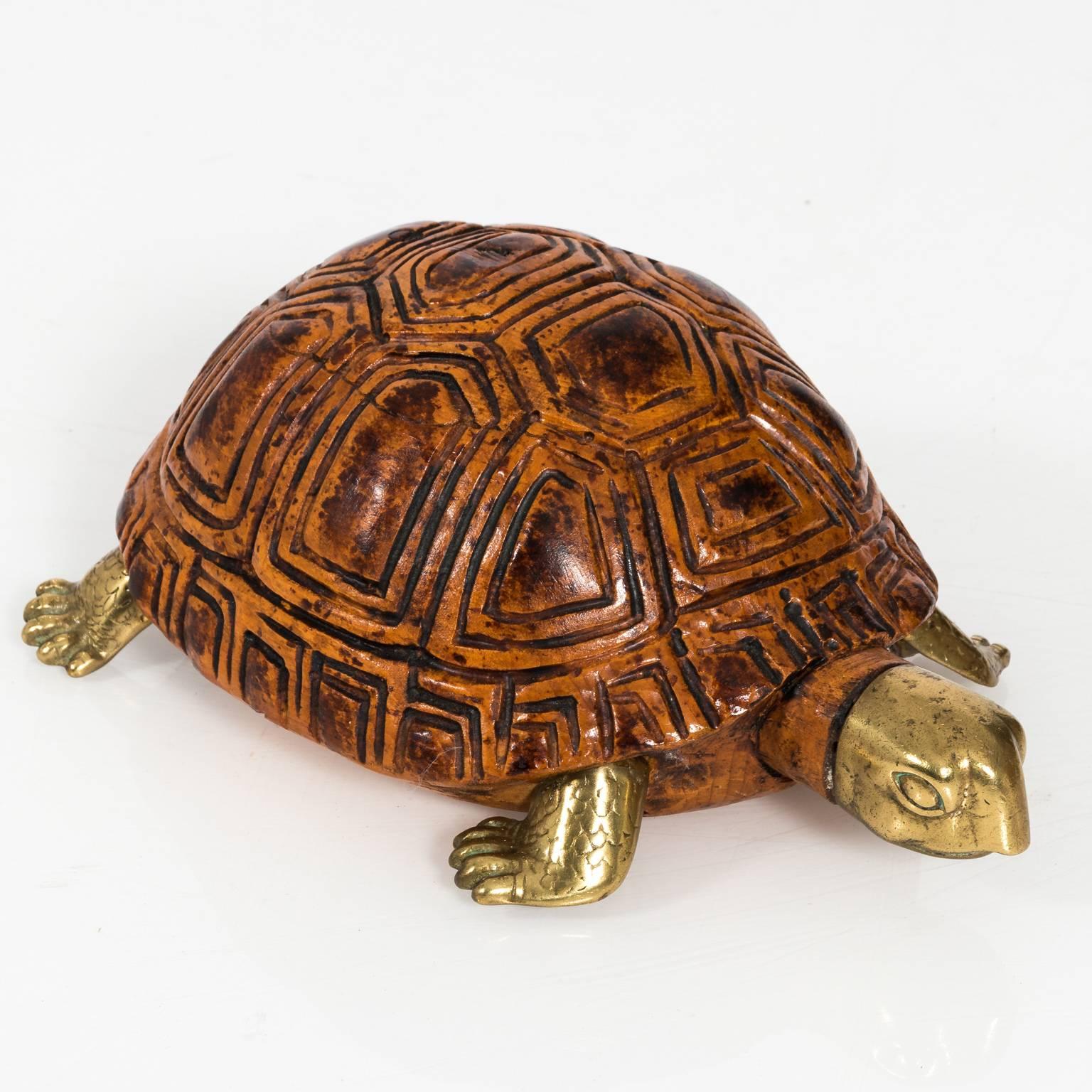 Painted wood and brass turtle by Sarreid LTD with detailing on the shell, circa mid-20th century.
 