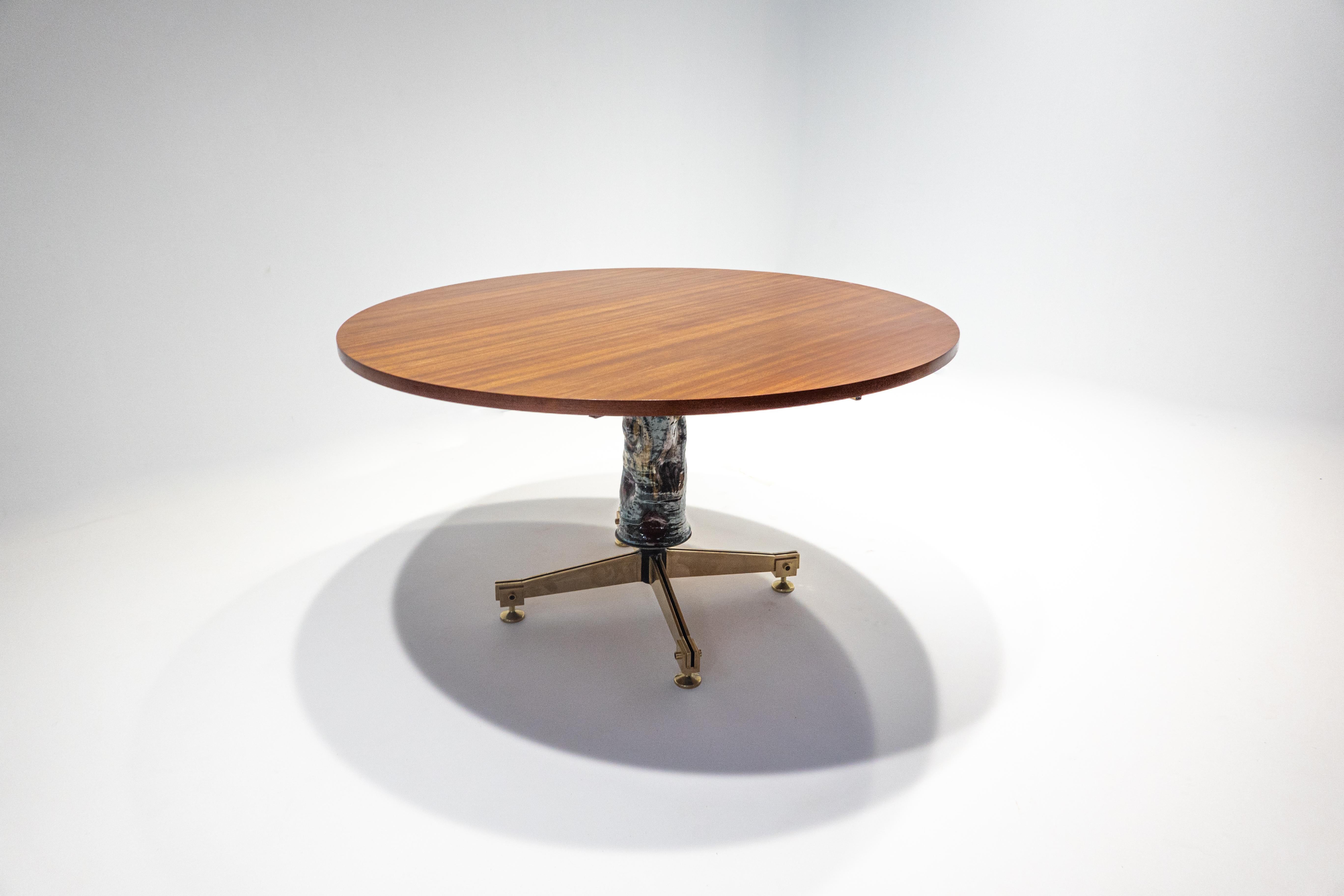 Mid-Century Modern wood and ceramic extendable dining table by Melchiorre Bega and Pietro Melandri, Italy, 1950s

Dimensions : 

139,5 to 220 cm W.