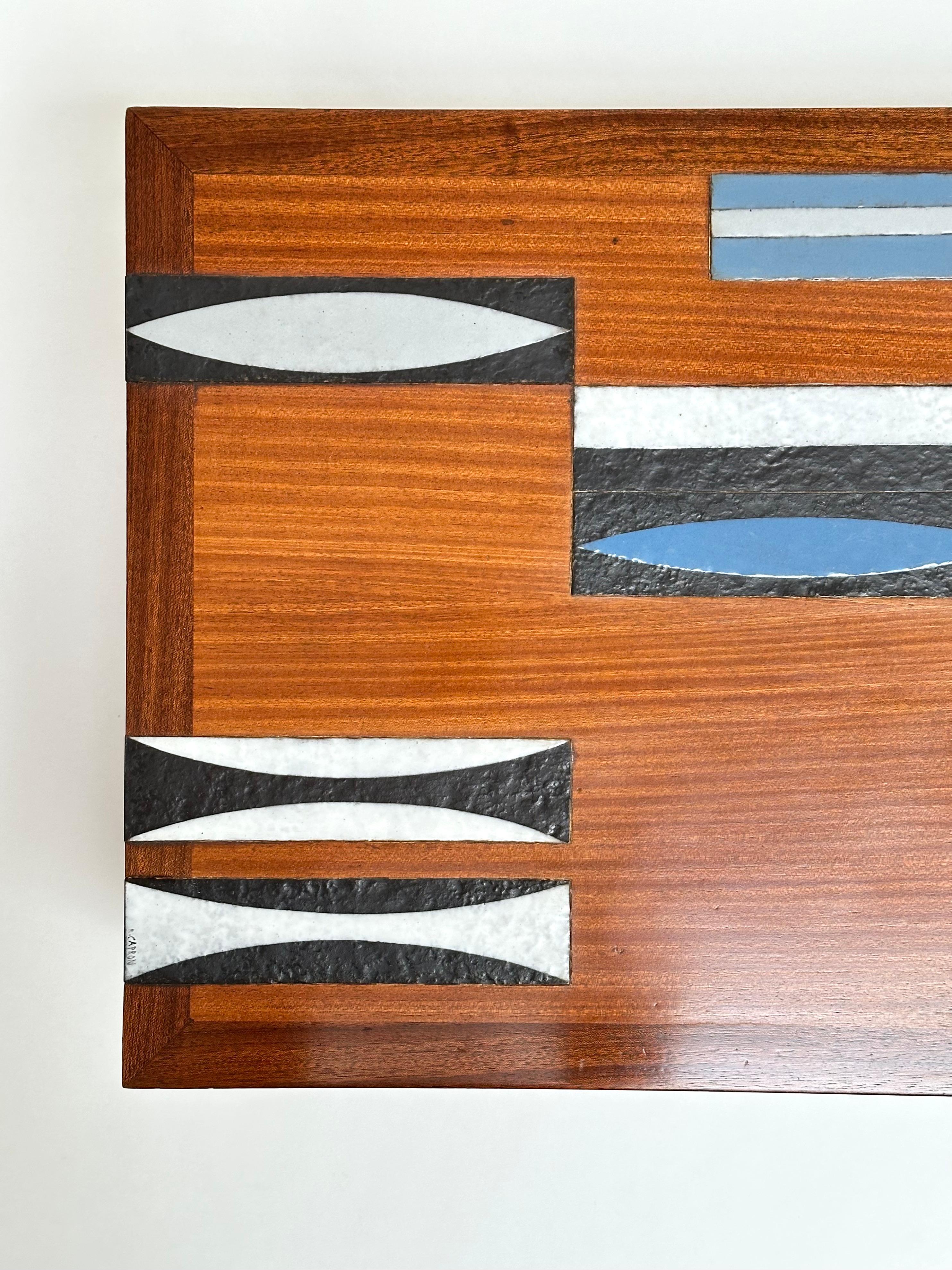 Exceptional teak coffee table with the iconic 