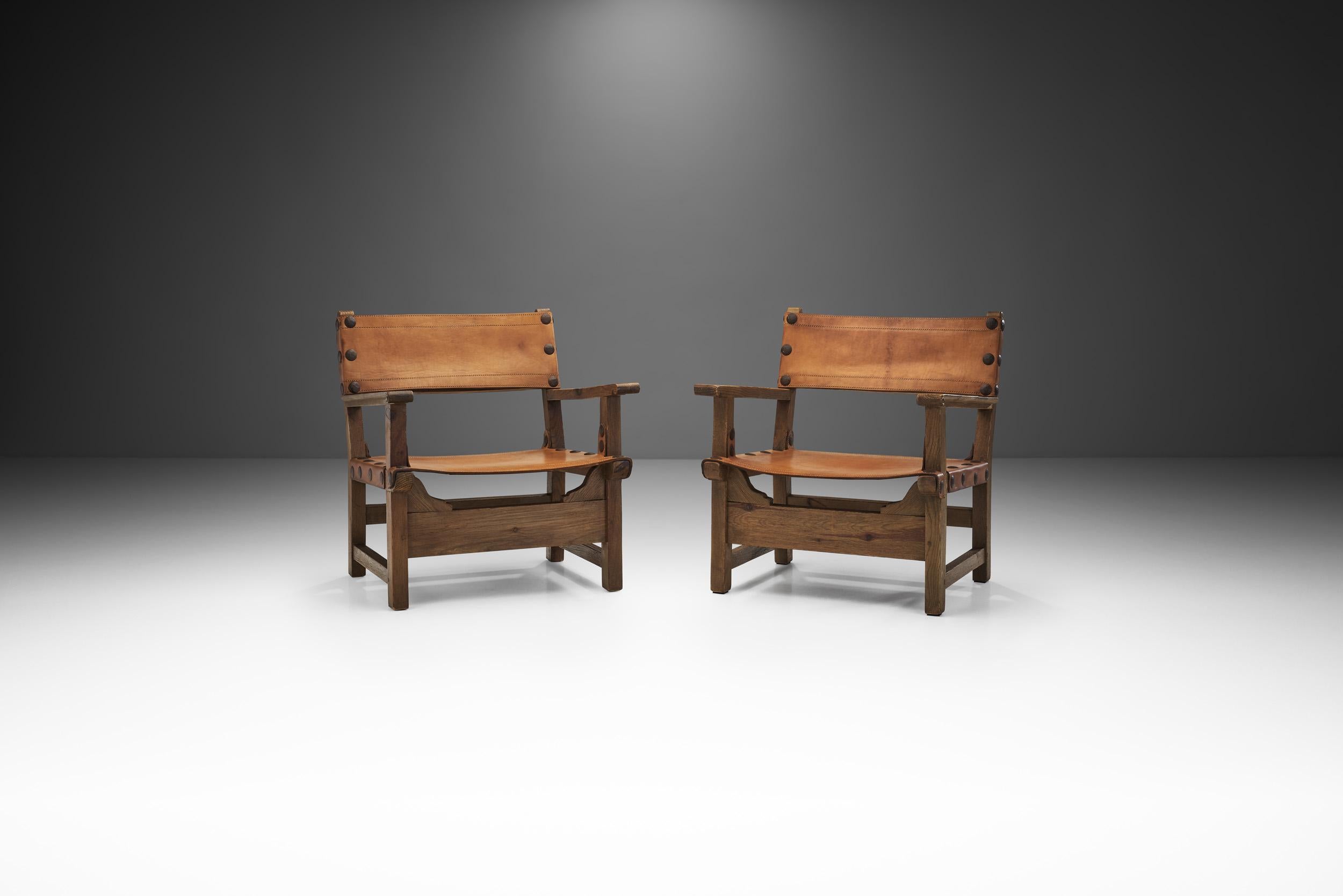 This pair of chairs might seem bold and rugged at first glance, however, at closer inspection, it is clear that the design is very well-thought-out; the lines are precisely sculpted, and the joinery precise and tight.

These so-called “Spanish