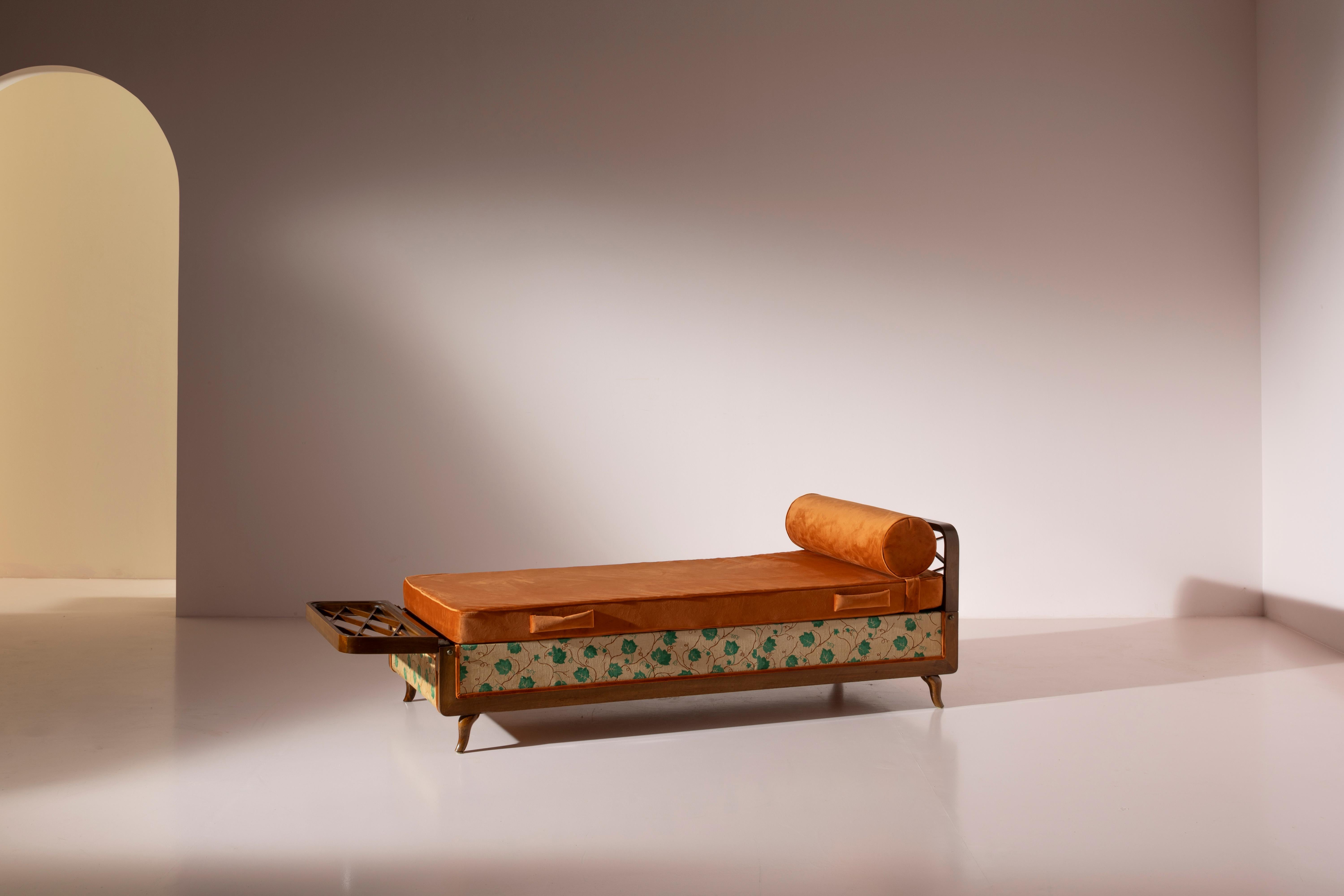 Italian Wood and fabric daybed with foldable armrests and storage unit, Italy, 1950s For Sale