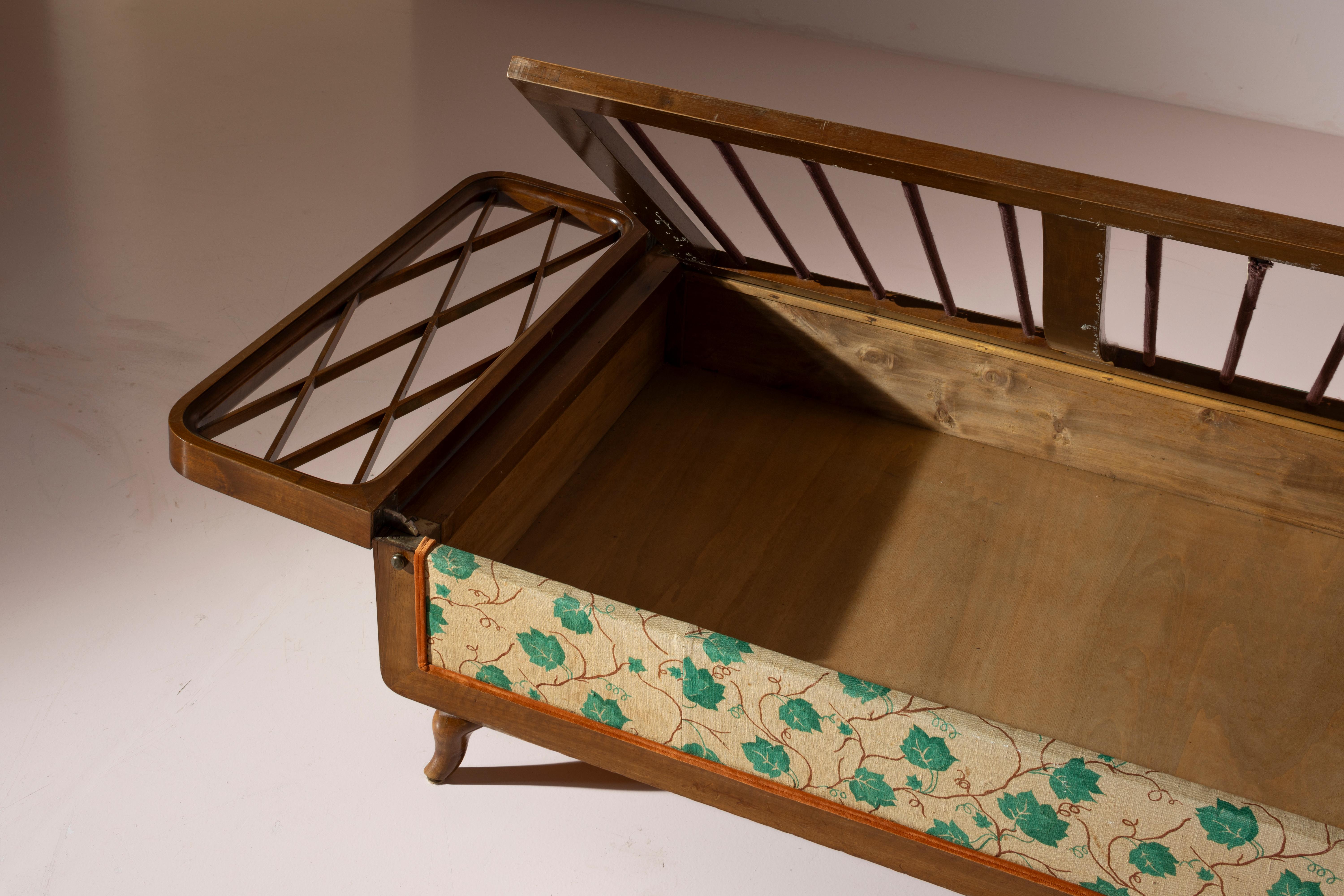 Mid-20th Century Wood and fabric daybed with foldable armrests and storage unit, Italy, 1950s For Sale