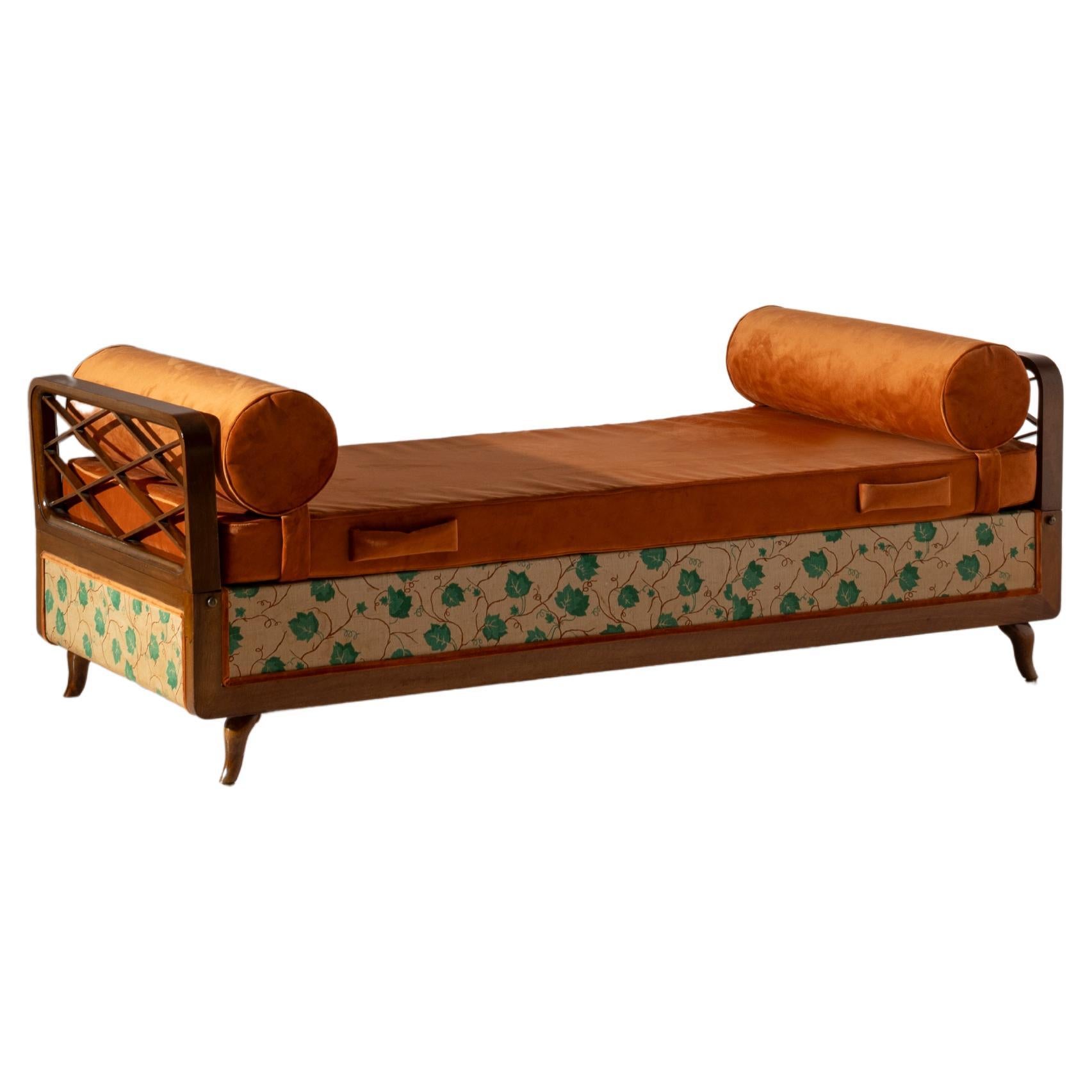 Wood and fabric daybed with foldable armrests and storage unit, Italy, 1950s For Sale