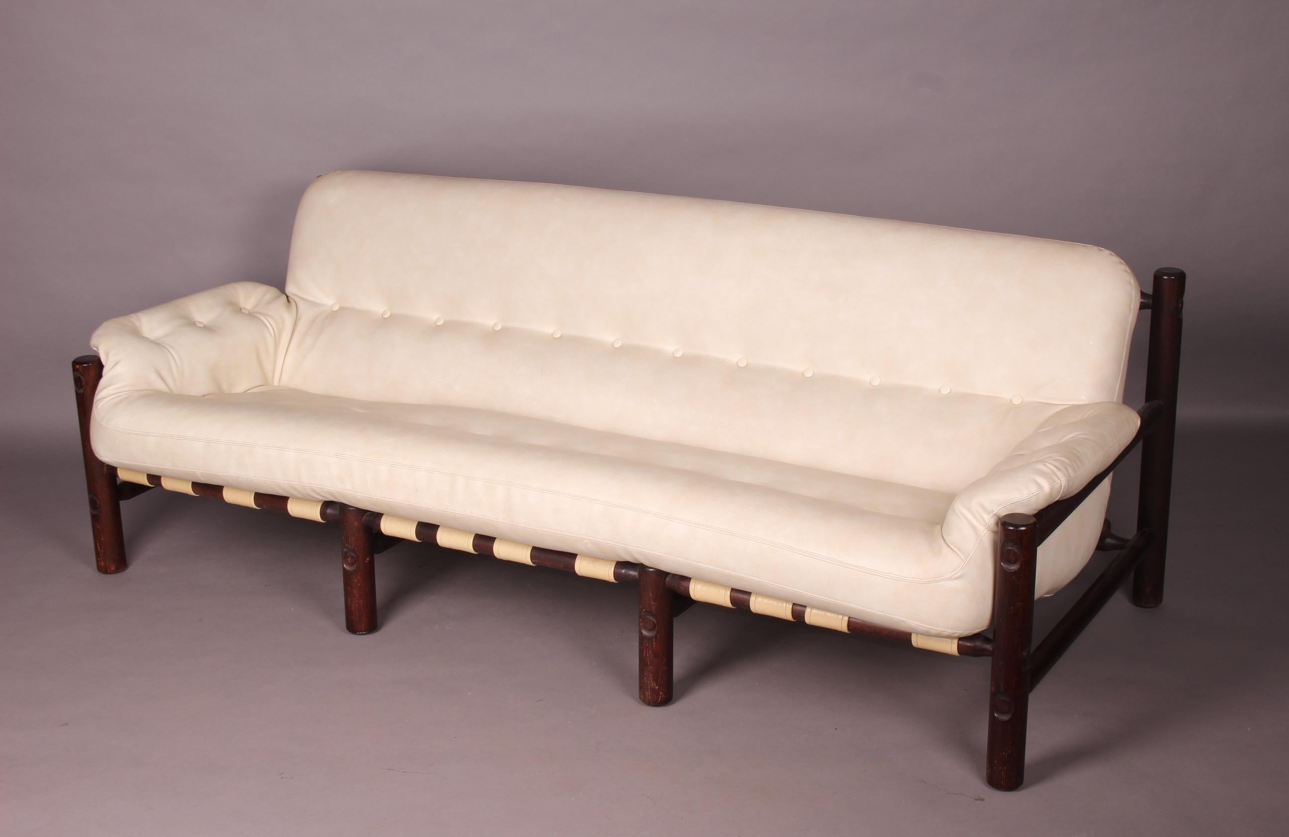 Wood and faux leather sofa , the skai must be cleaned and two missing buttons are missing as can be seen in the photo.
