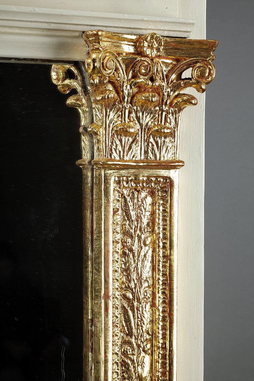 Gilt Wood and Gilded Stucco Overmantel Mirror, Empire Period, 19th Century For Sale