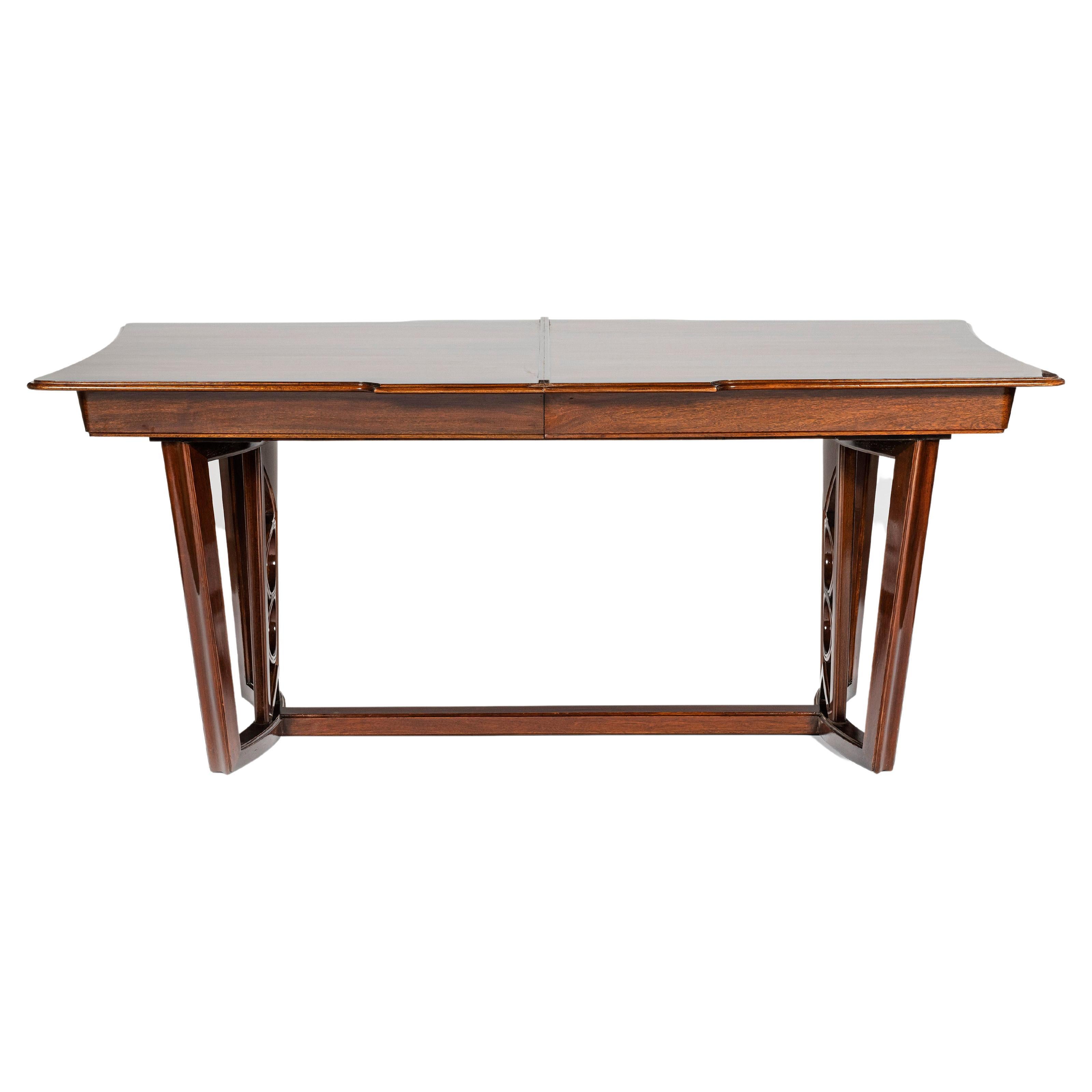 Wood dining room table with two extensions by Englander & Bonta, Argentina, Buenos Aires, circa 1950.

Table dimensions with both extensions: 77 cm height, 280 cm width, 100 cm depth.
Table dimensions without extensions: 77 cm height, 180 cm