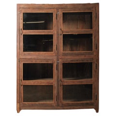 Wood and Glass Four-Door Display Cabinet with Patinated Finish