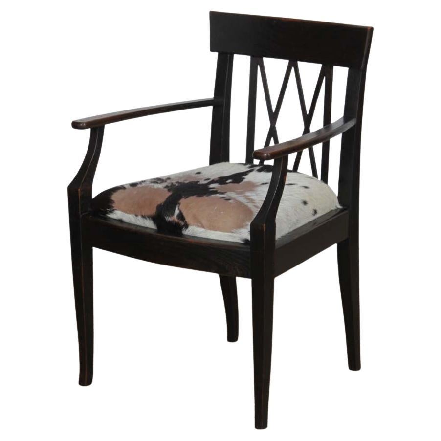 Wood and hide bridge chair, early 20th century