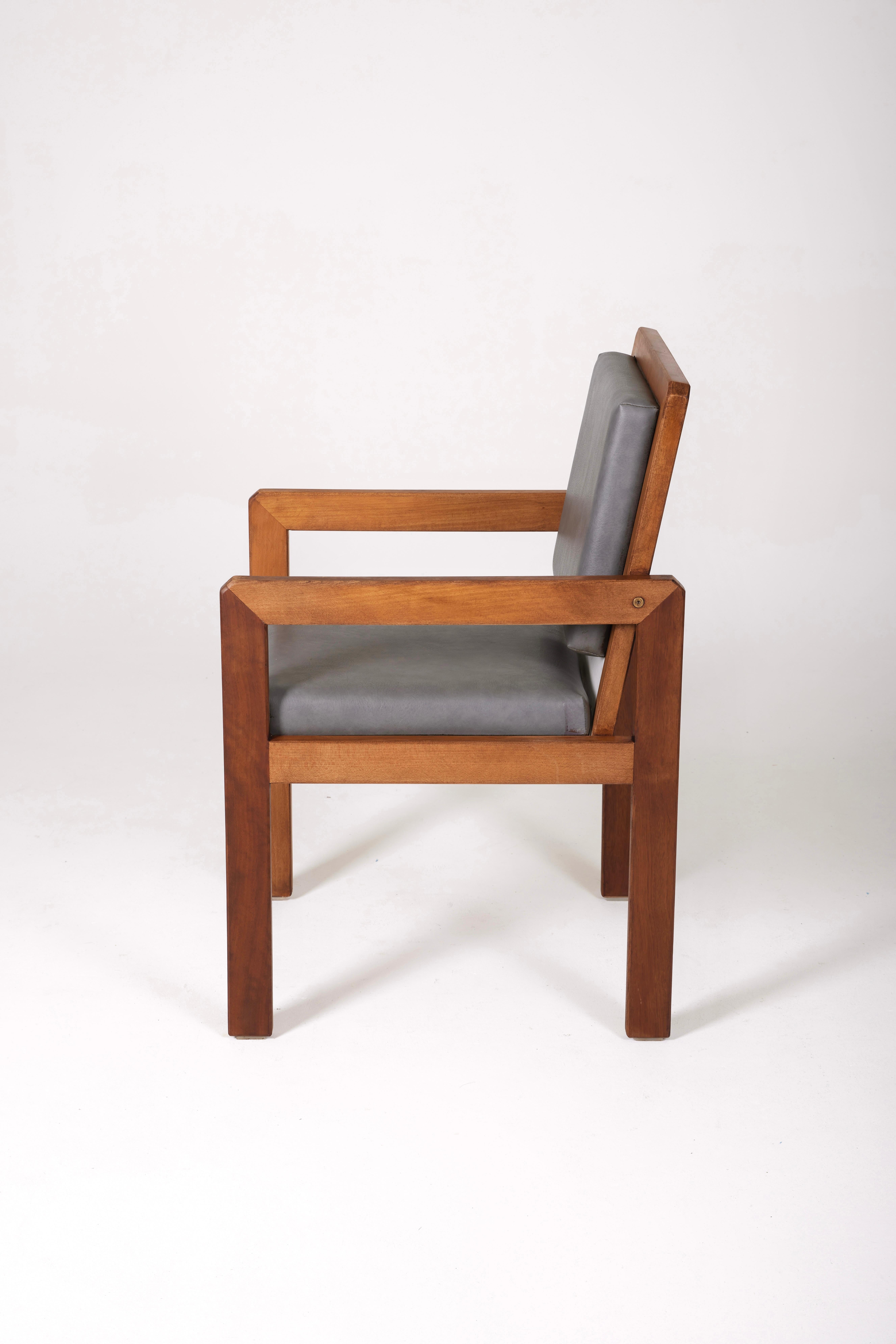 20th Century Wood and leather armchair by the french designer André Sornay For Sale
