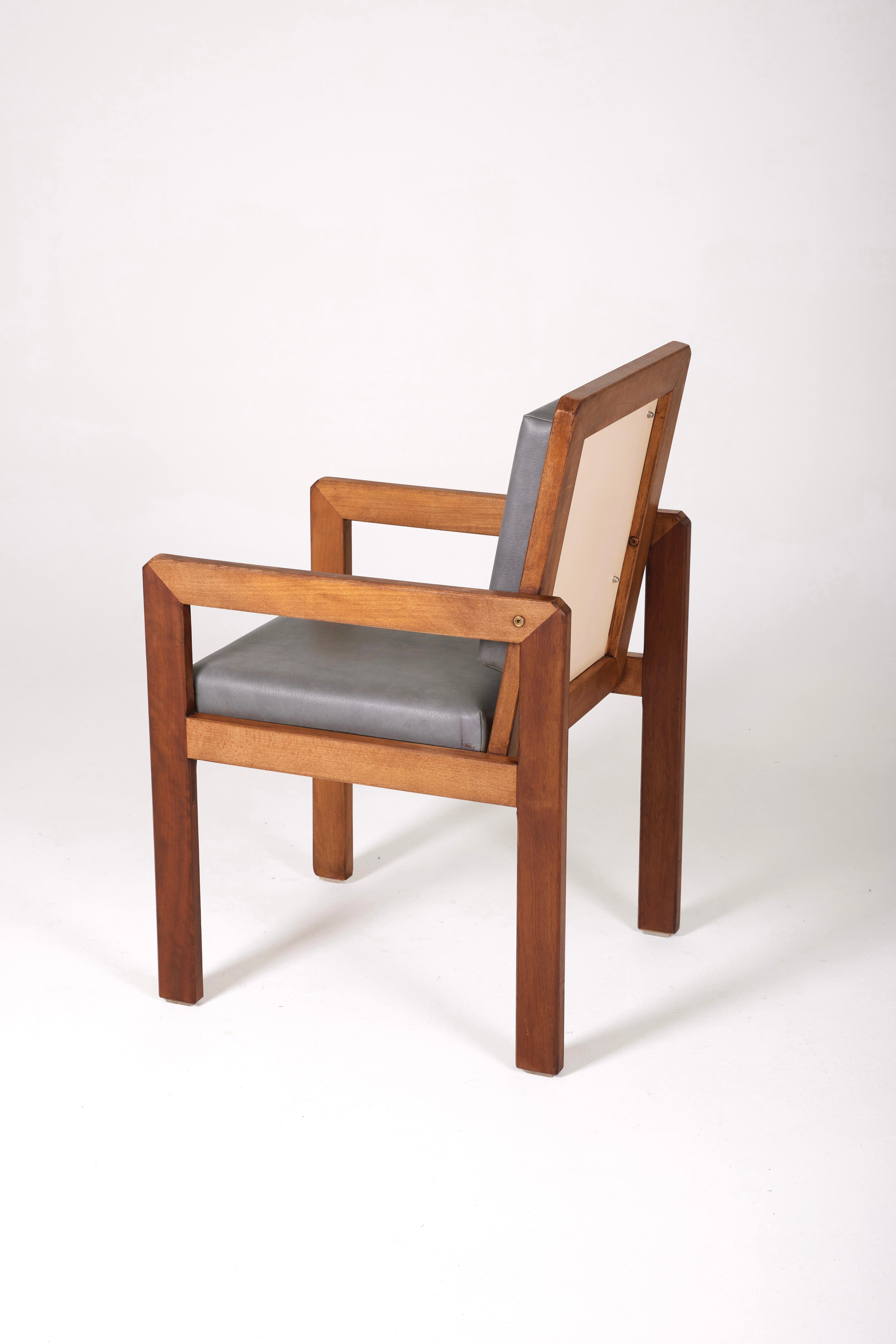 Leather Wood and leather armchair by the french designer André Sornay For Sale