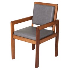 Vintage Wood and leather armchair by the french designer André Sornay