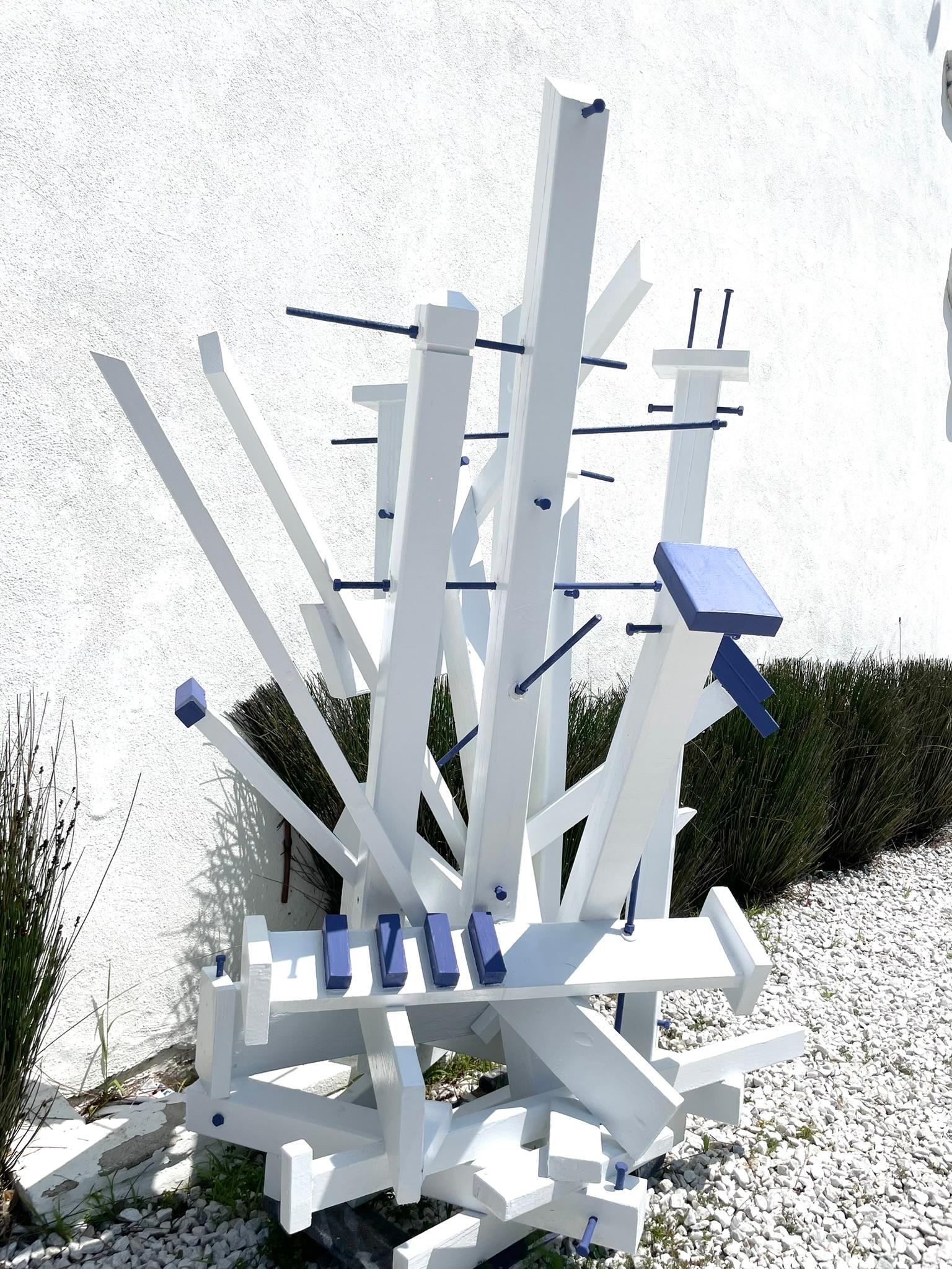 Beautiful combination of wood and metal in white and Yves Klein blue. Indoor or outdoor sculpture.
 