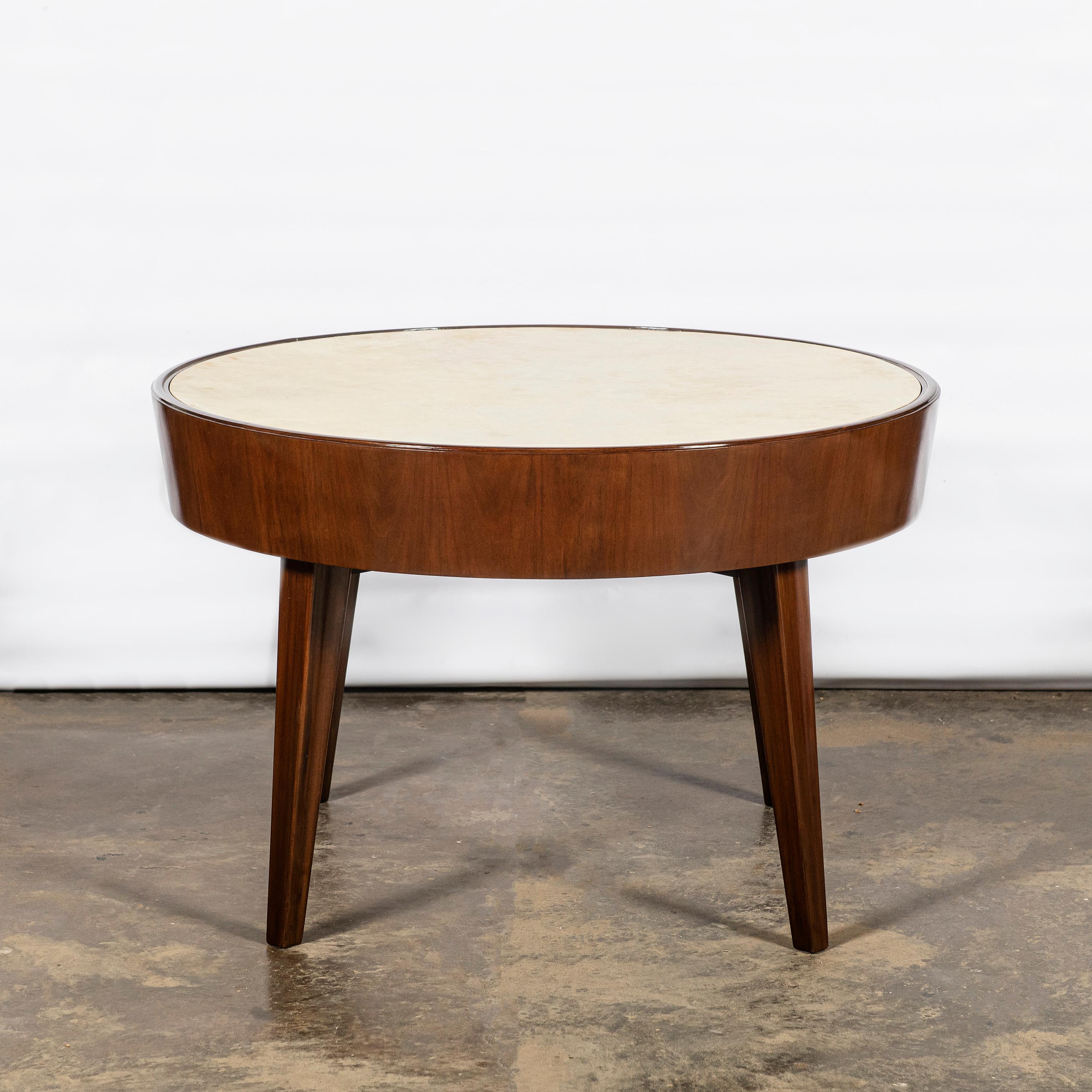 Wood and parchment low round table by Comte. Argentina, Buenos Aires, circa 1950.