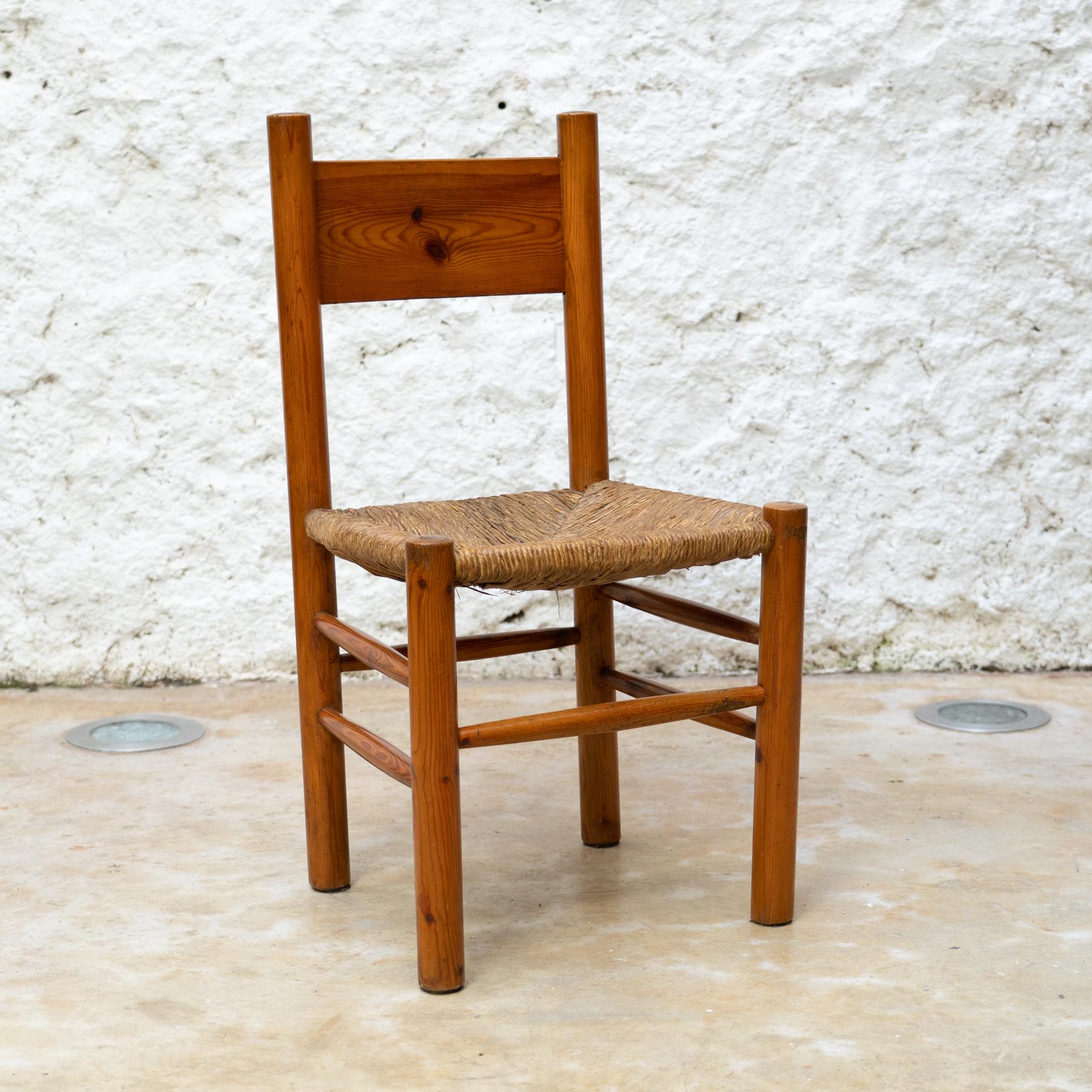 Wood and Rattan Mid Century Modern Chair After Charlotte Perriand, circa 1960

By unknown manufacturer, France

In original condition, preserving a beautiful patina, with minor wear consistent of age and use.