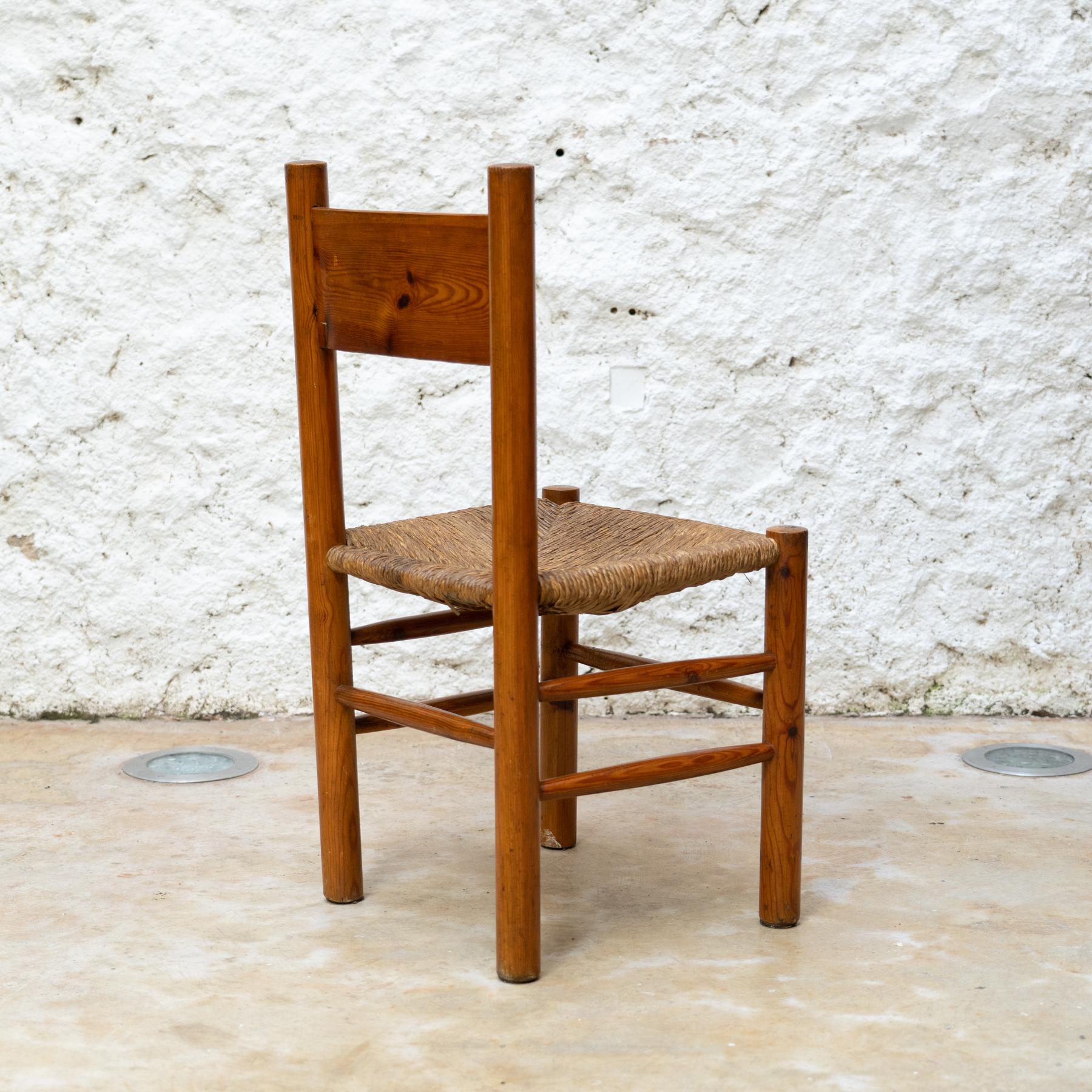 French Wood and Rattan Mid Century Modern Chair After Charlotte Perriand, circa 1960 For Sale
