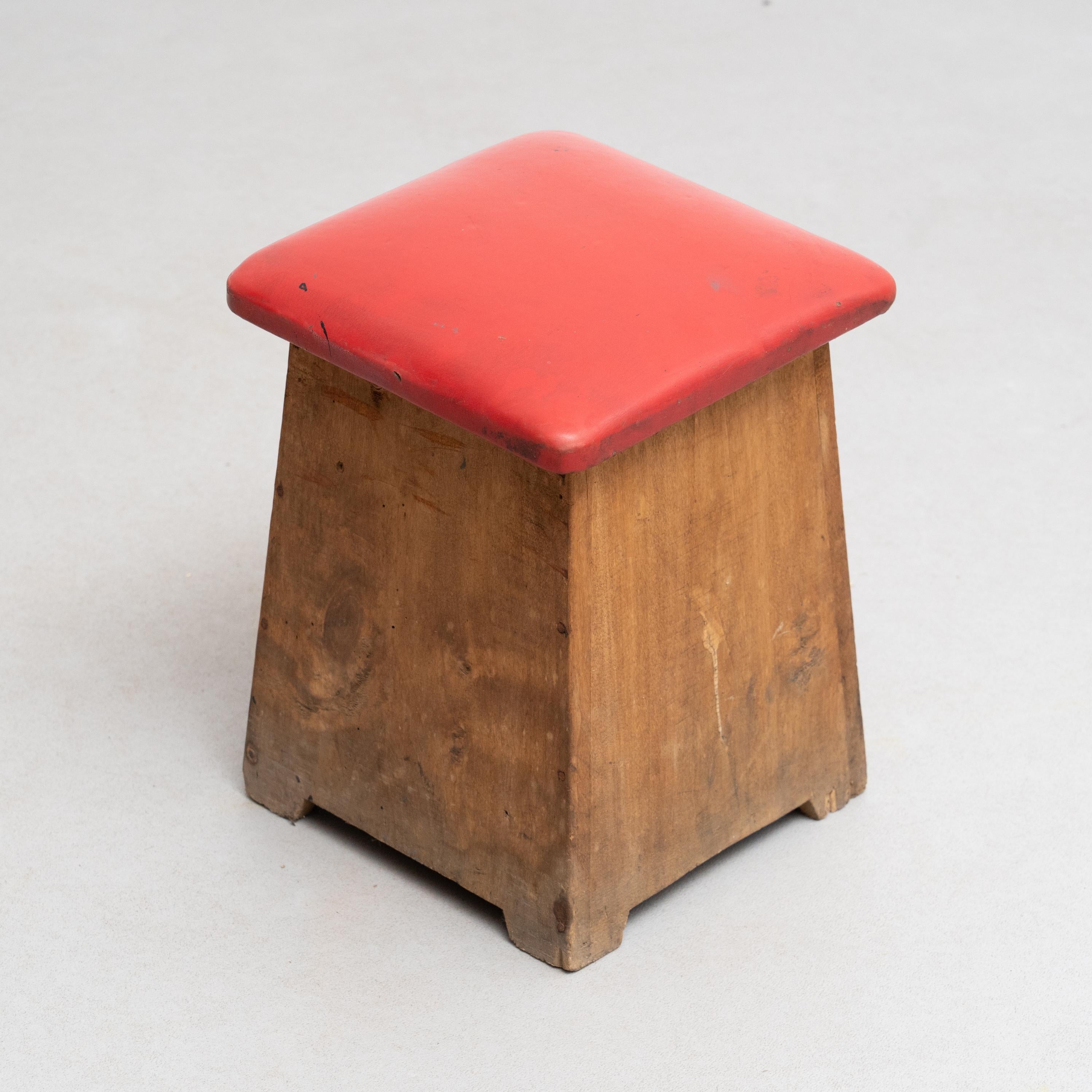 Vintage wood stool.

By unknown artisan in Spain, circa 1960.

In good original condition, with minor wear consistent with age and use, preserving a beautiful patina.

Materials:
Wood.
Skai.
 