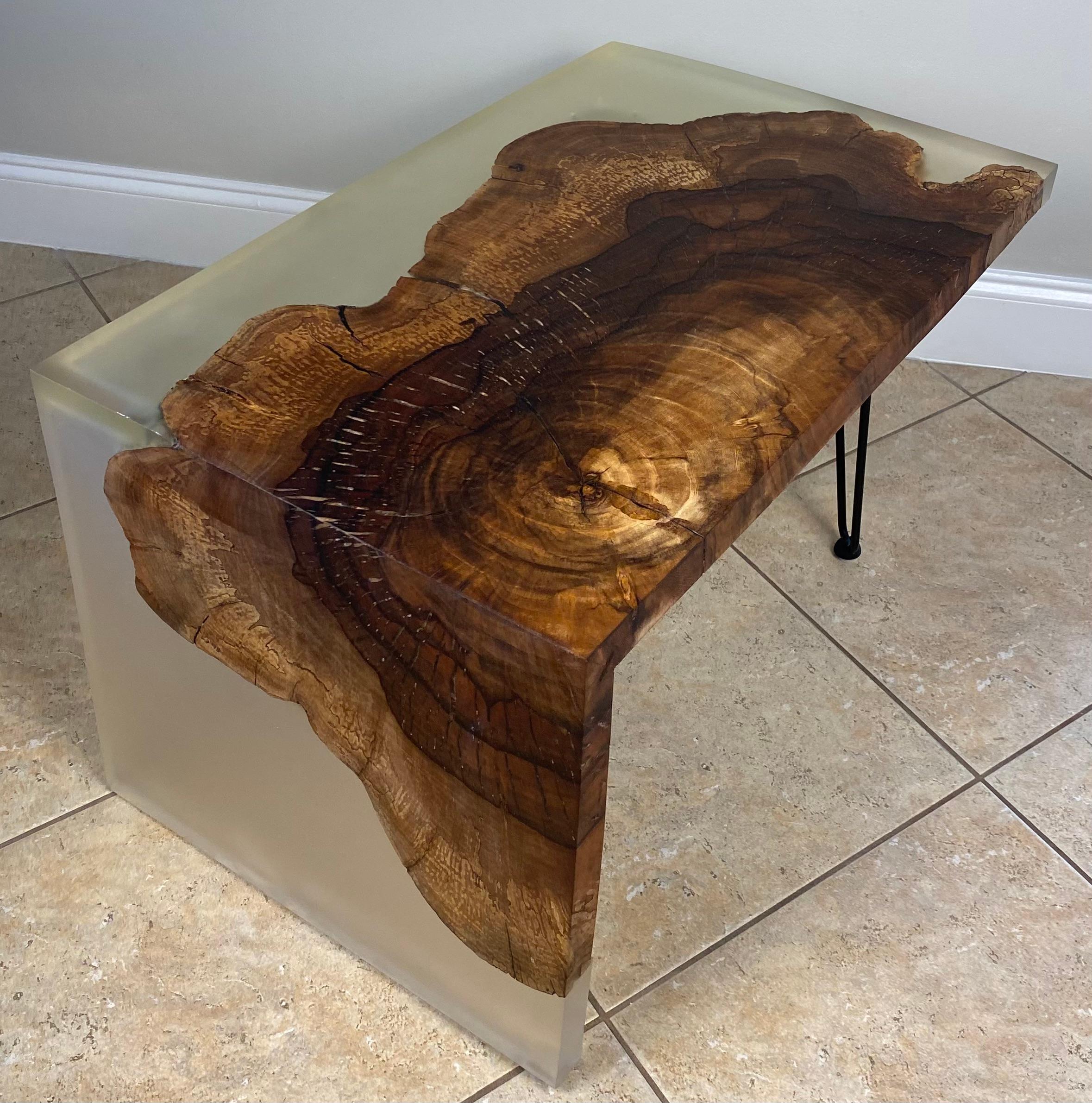 Stylish mid-century modern coffee table or when separated a pair of mid-century end tables.
Wonderfully constructed of wood and resin with a cantilevered design. 

Dimensions:
separate end tables 18 1/2
