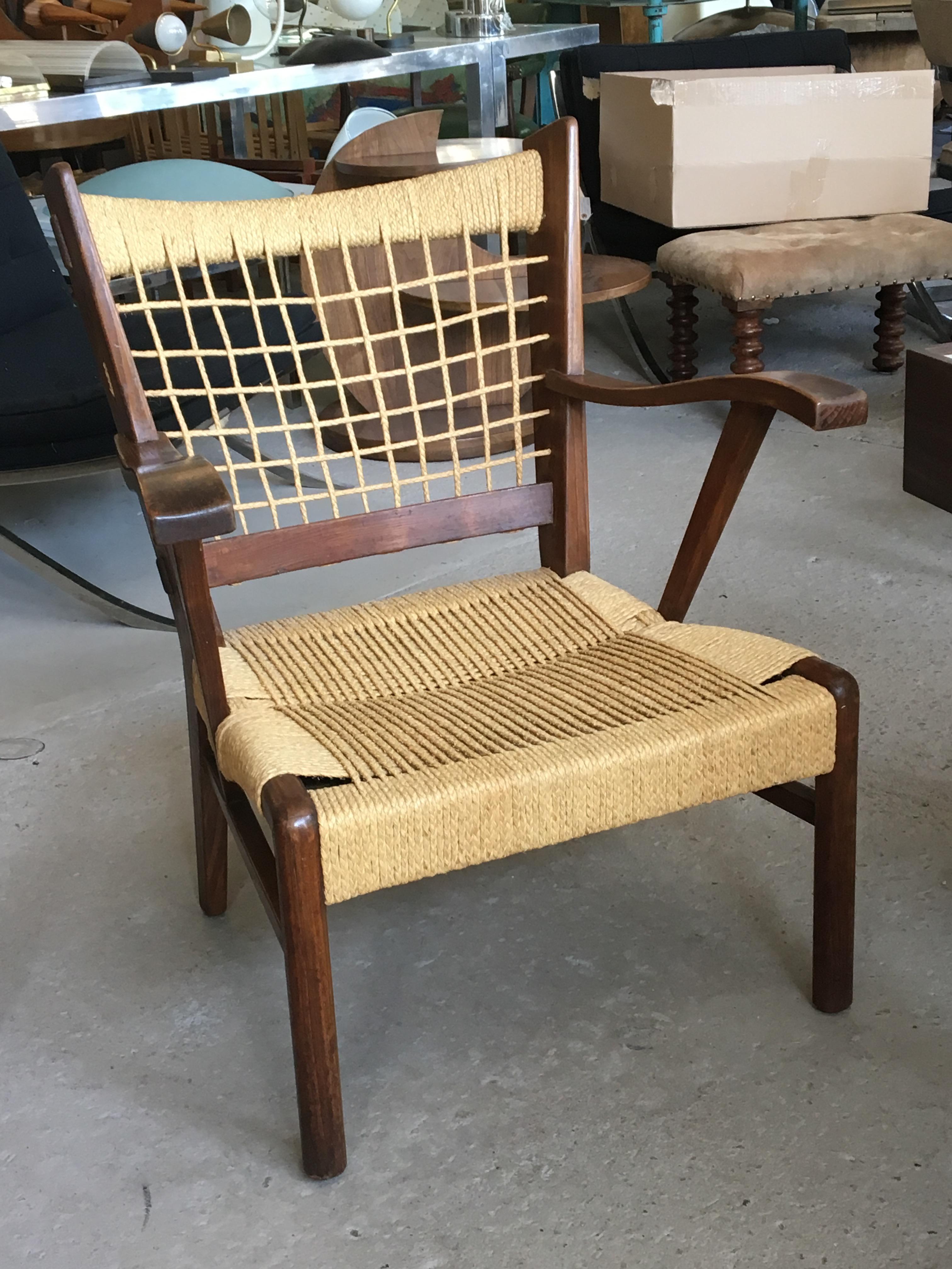 Rare walnut armchair by Guglielmo Pecorini circa 1935, with roping in superb condition. Distinctive Makers Mark. Documented in Domus Magazine No. 173, May 1942.