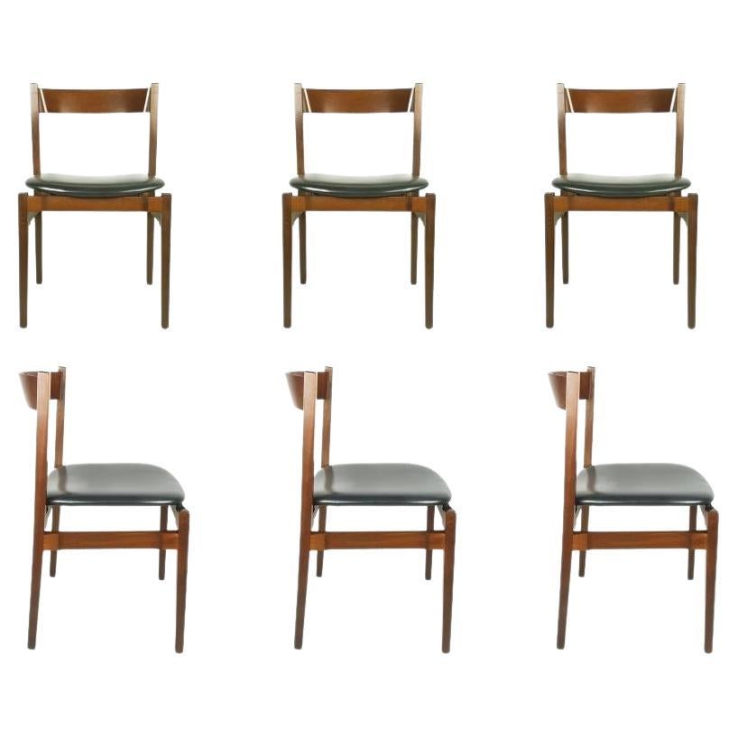 Wood and skai, 1960s dining Chairs Model 104 by G. Frattini for Cassina For Sale
