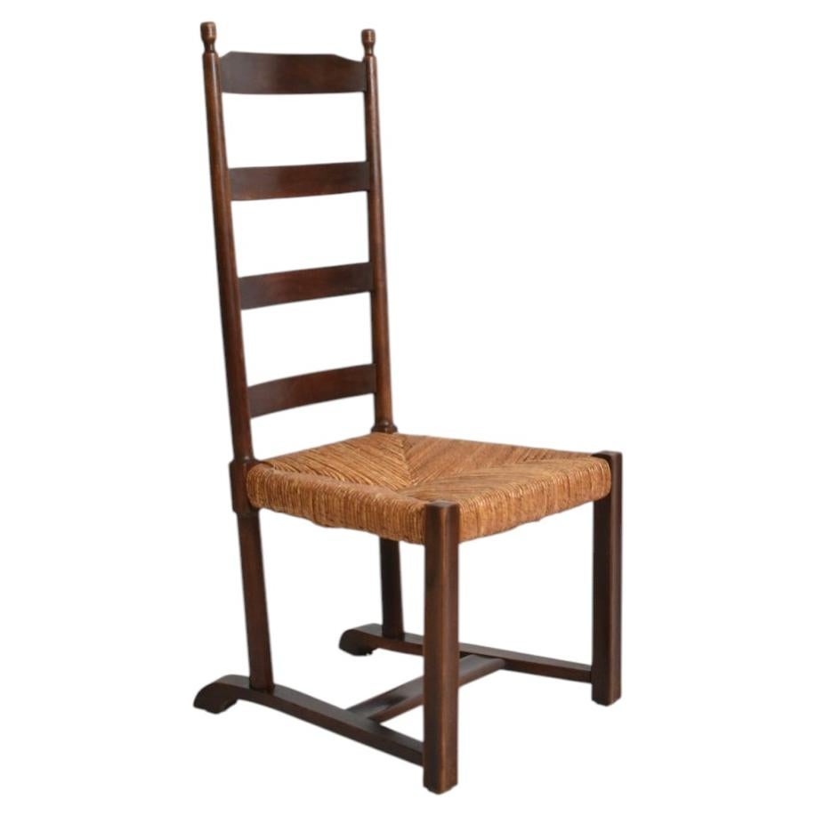 Wood and straw low chair, 1950s. For Sale